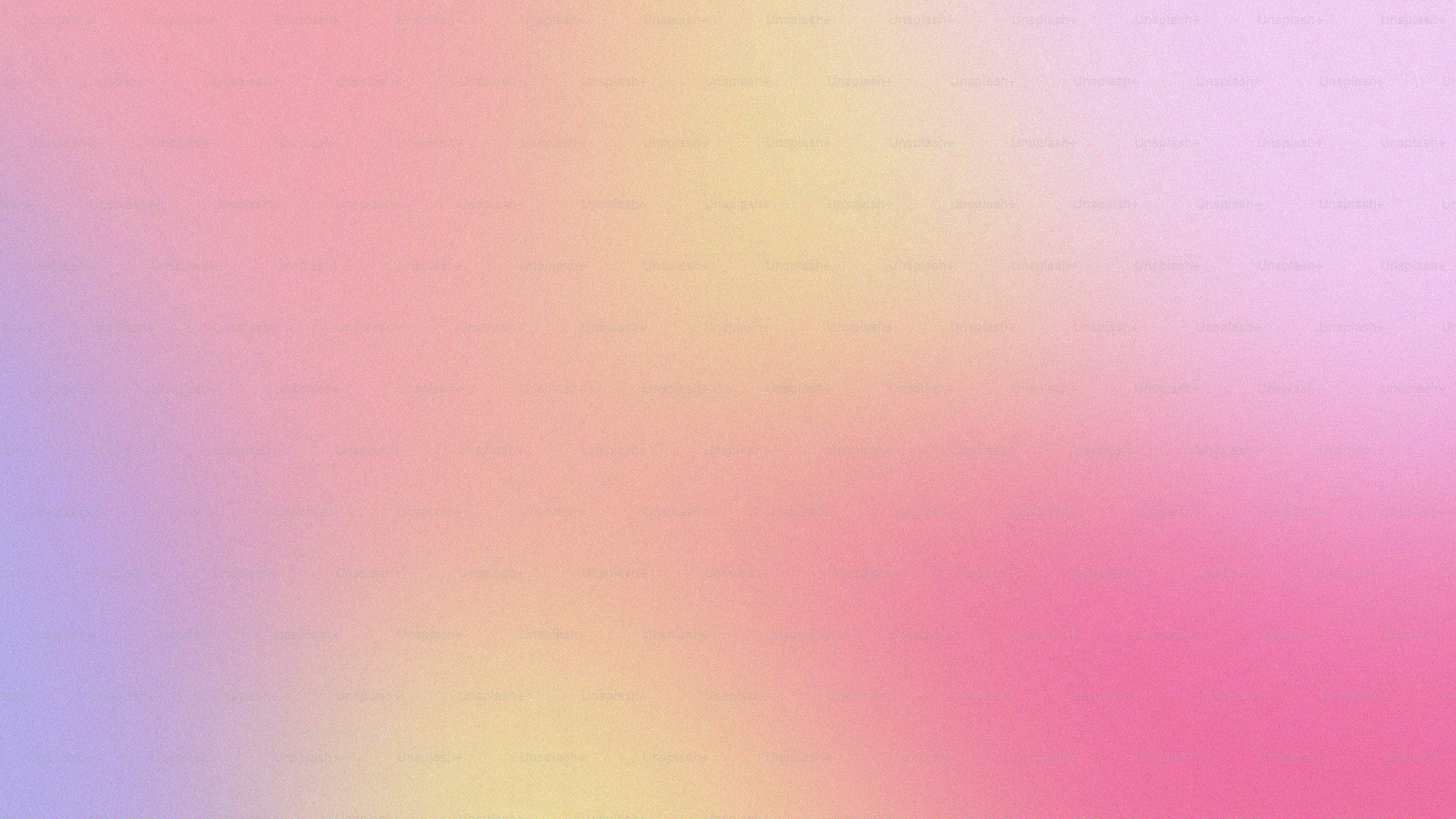 a blurry image of a pink and blue background