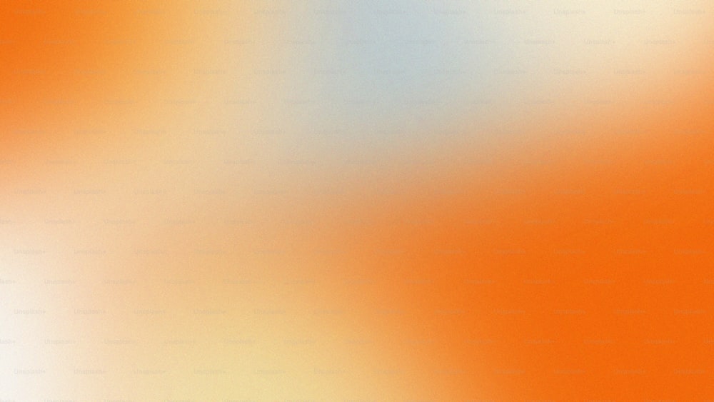 a blurry orange and blue background with a white border