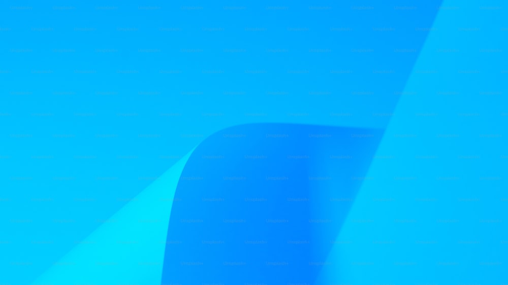 a blue background with a curved curve in the center