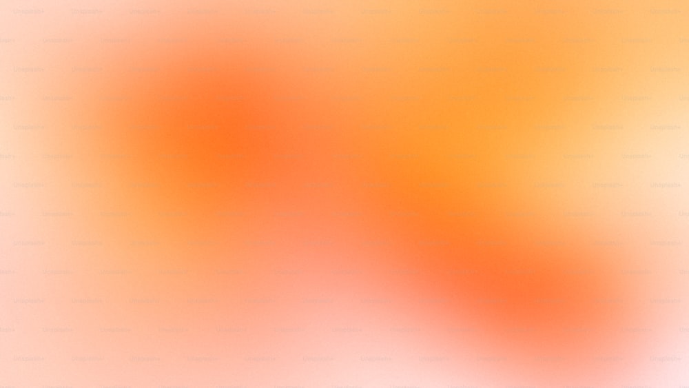 a blurry orange and yellow background with a white background