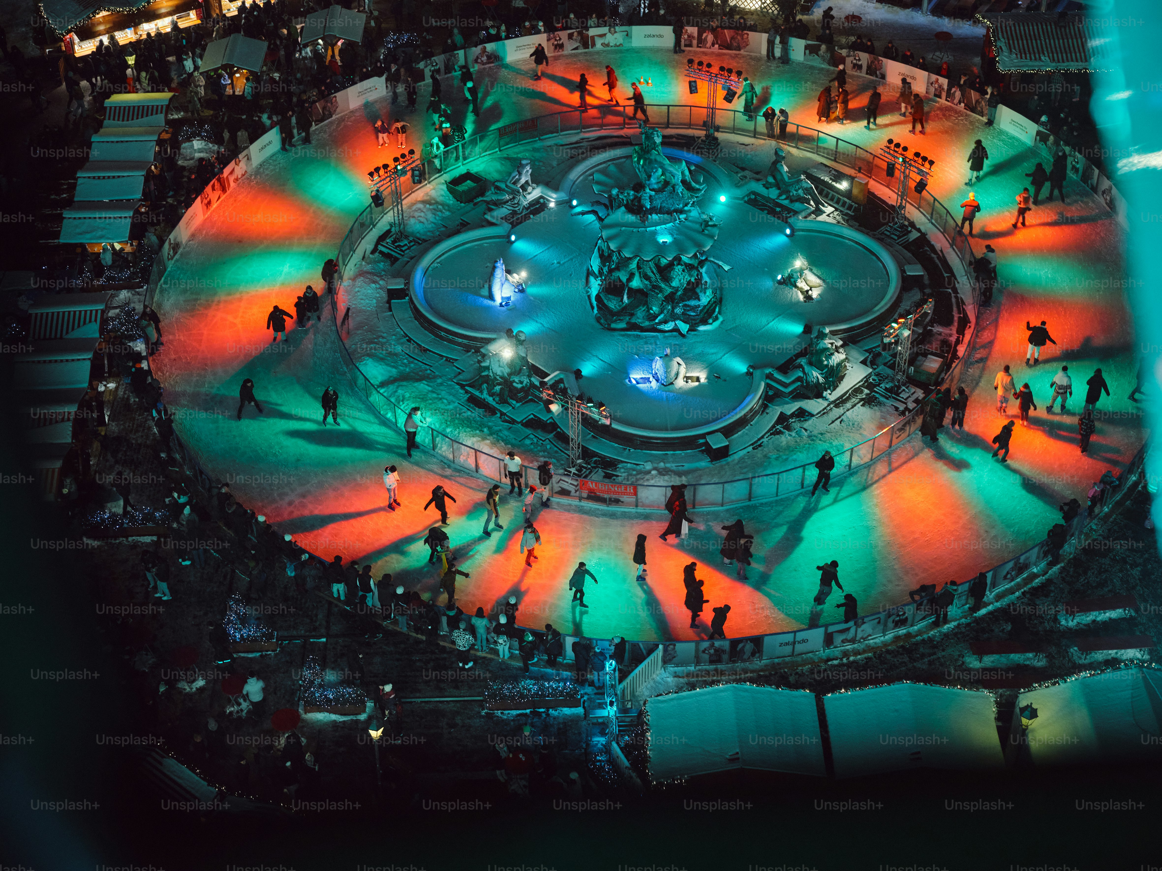 This is an ice skating ring made around a fountain in Alexanderplatz called Neptunbrunnen.