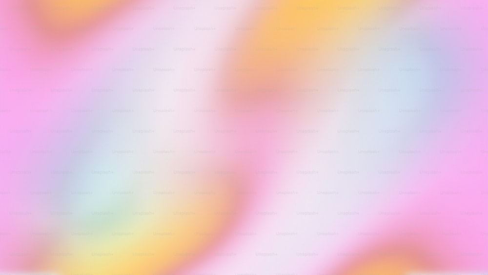 a blurry image of a pink and yellow background