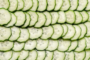 a bunch of cucumber slices stacked on top of each other