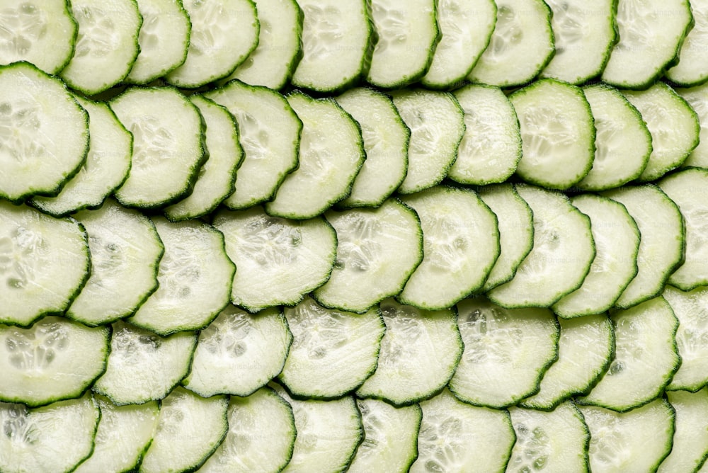 a bunch of cucumber slices stacked on top of each other