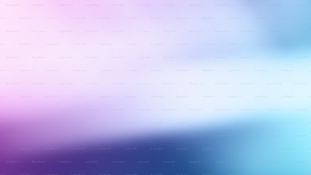 a blurry image of a blue and pink background