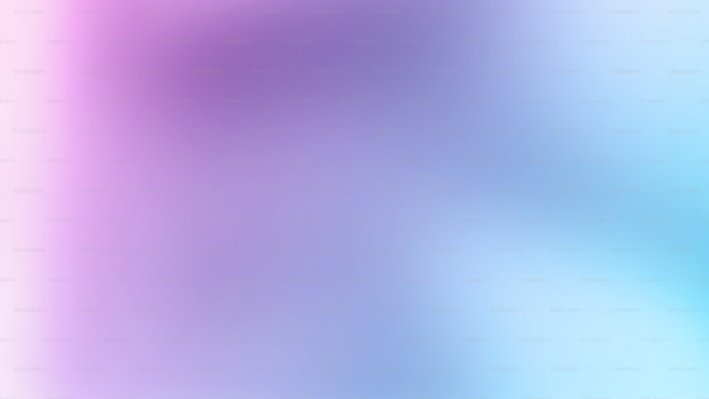 ein verschwommenes Bild mit blauem und rosafarbenem Hintergrund