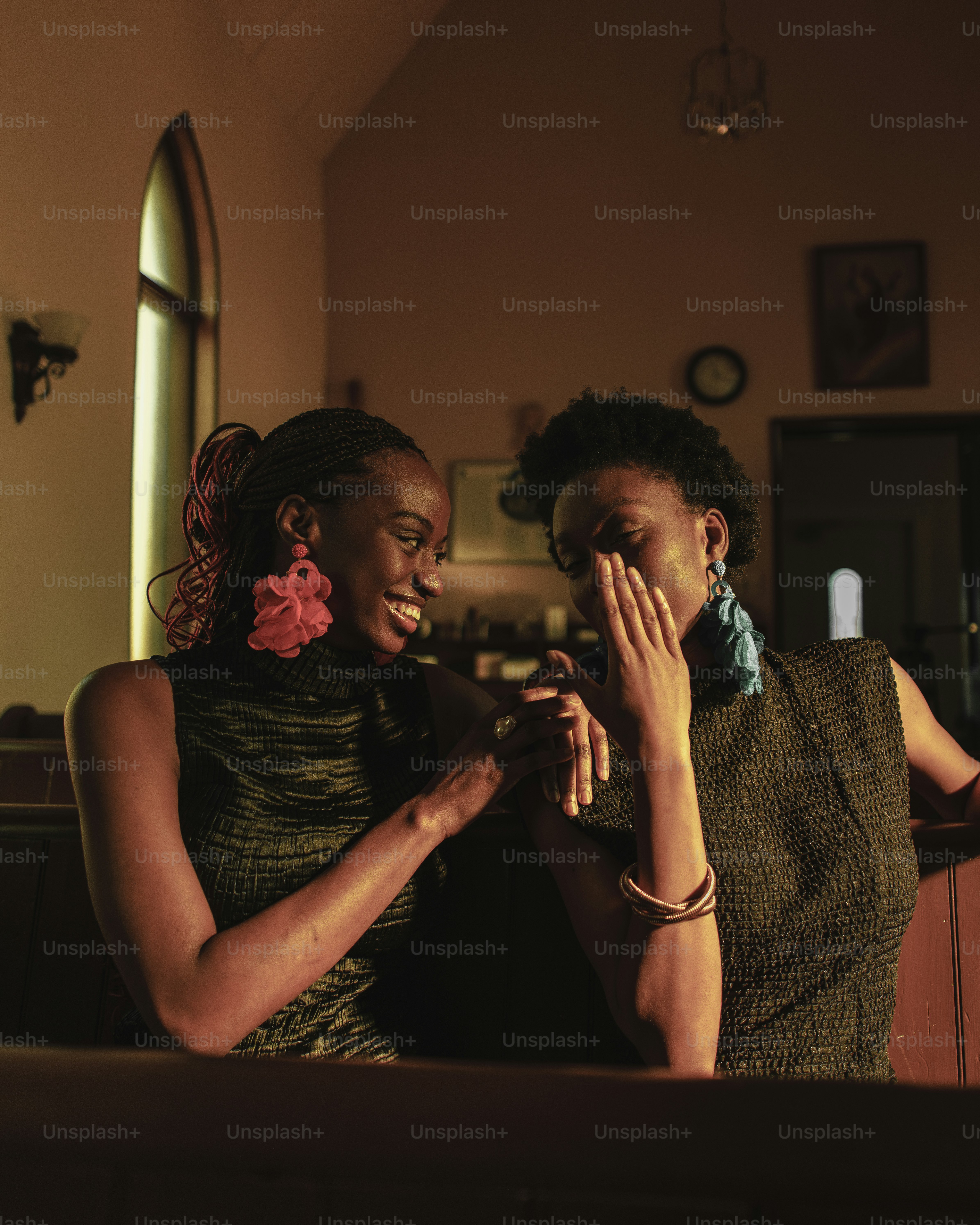 a couple of women standing next to each other