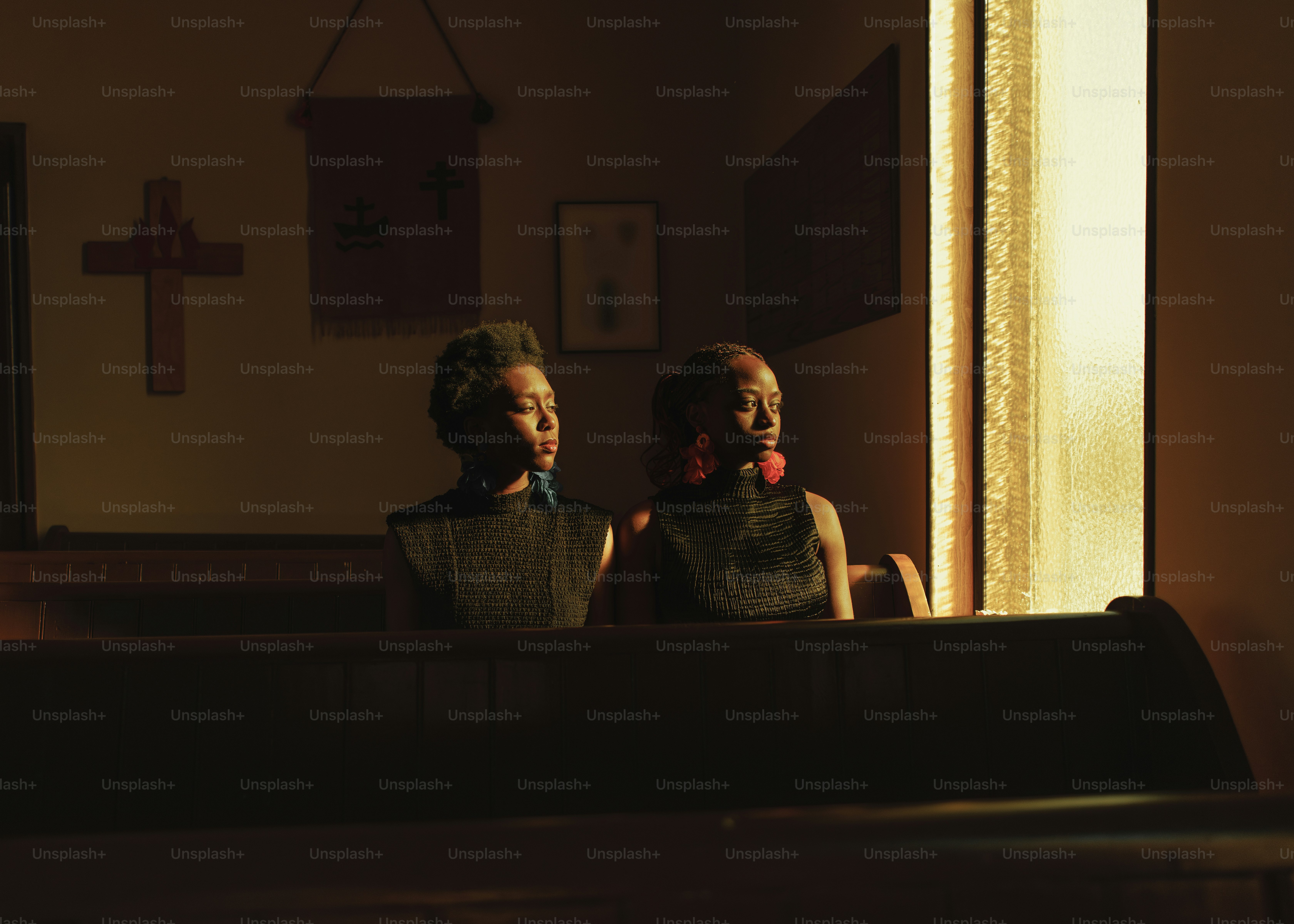 a couple of women sitting next to each other