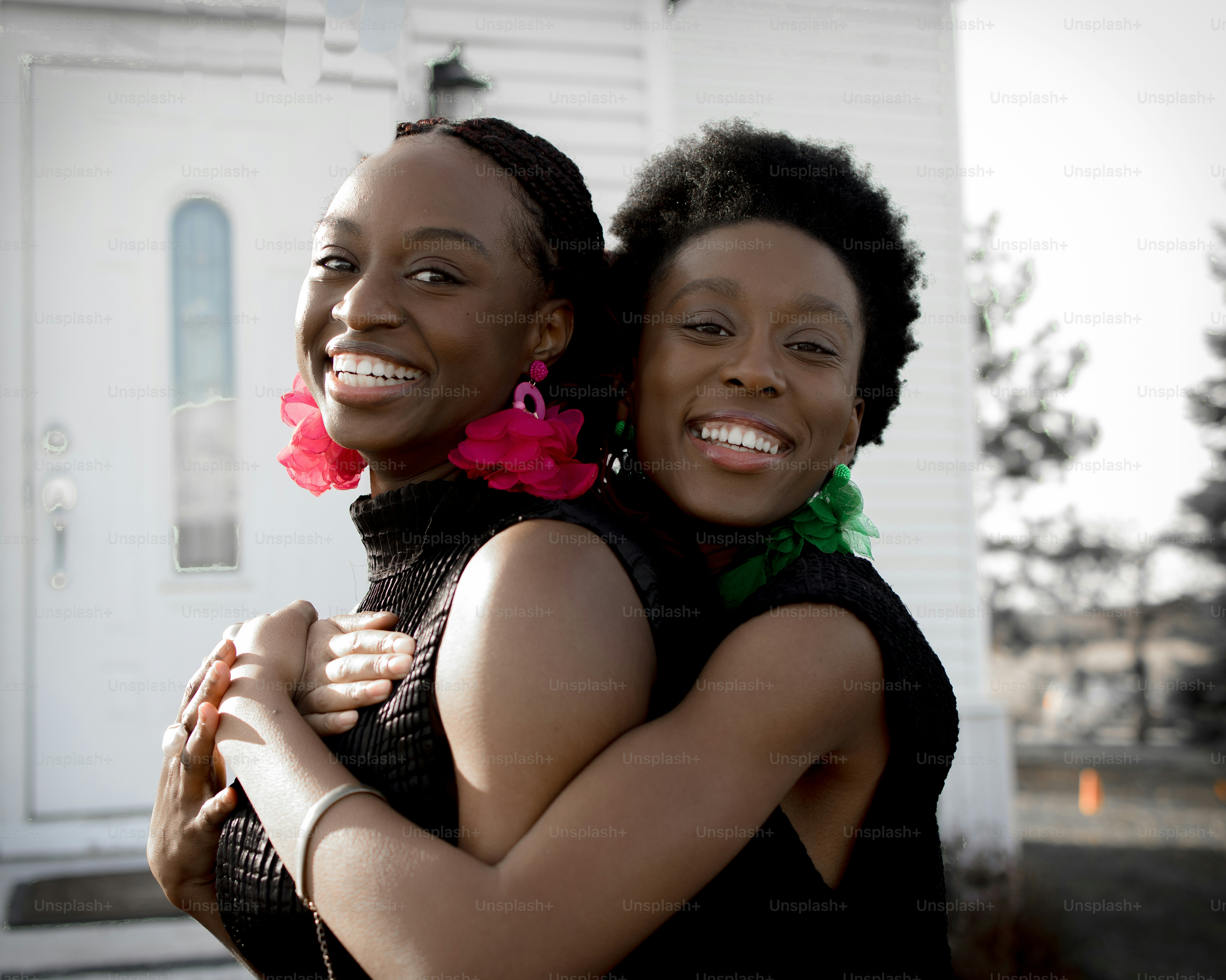 a couple of women standing next to each other