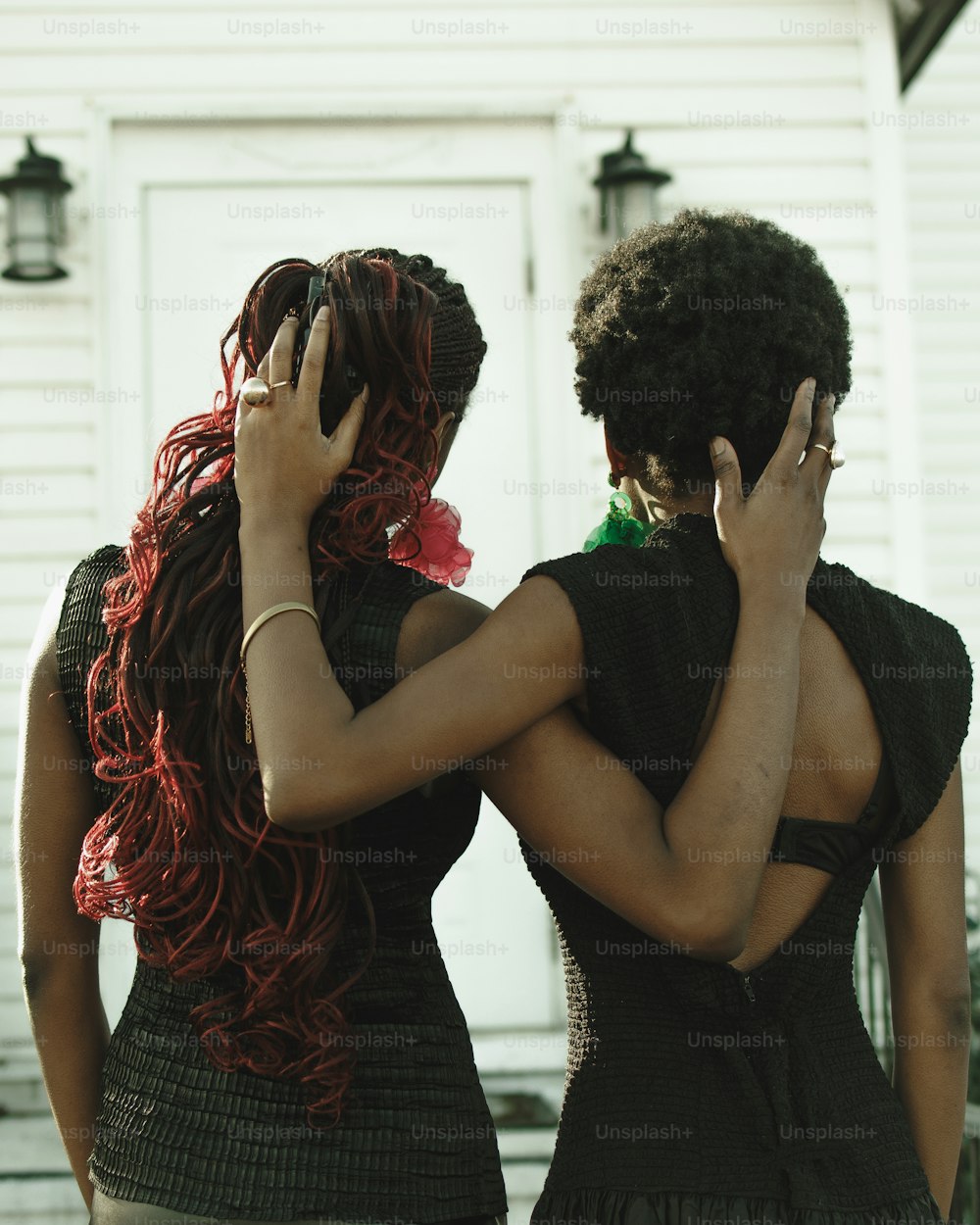 a couple of women standing next to each other