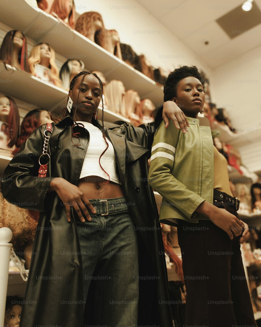 two women standing next to each other in a store