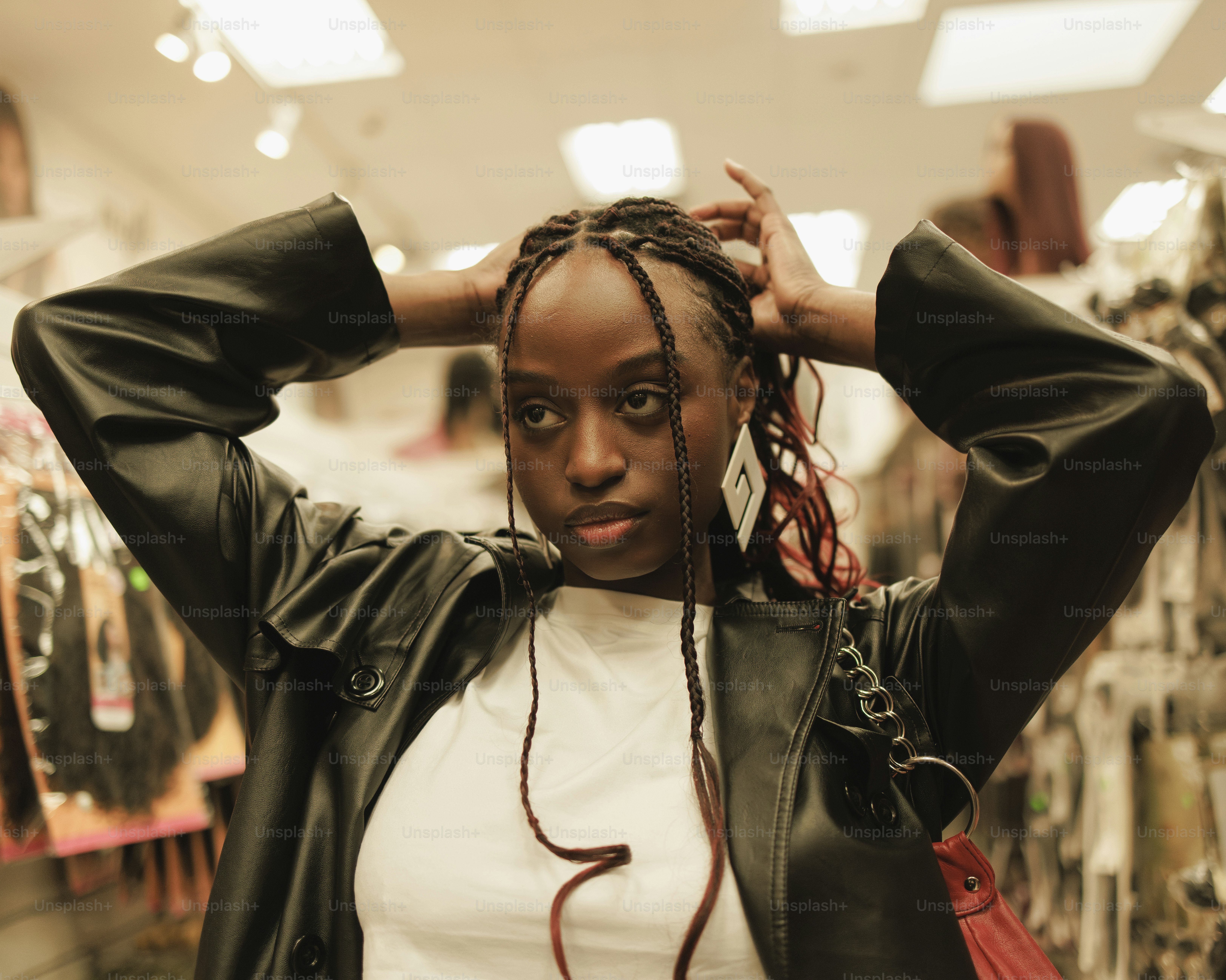 a woman with dreadlocks standing in a store