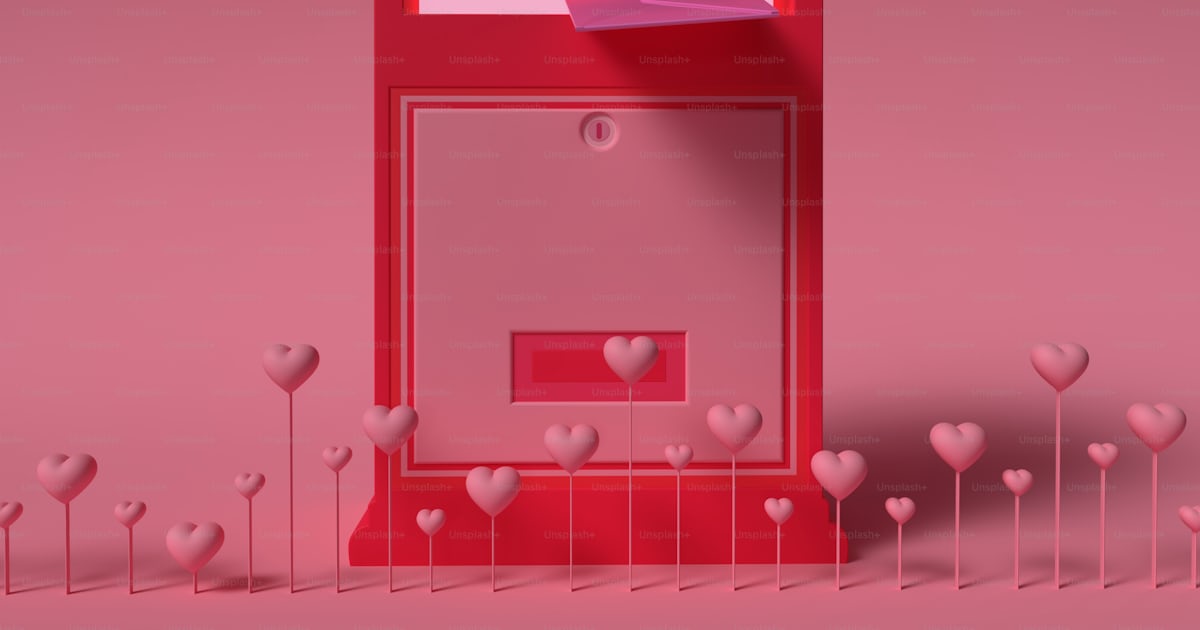 A red mailbox with hearts surrounding it photo – Love Image on Unsplash