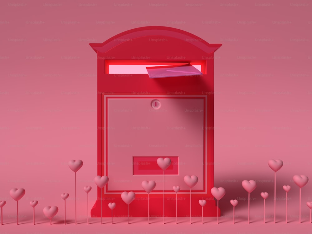 a red mailbox with hearts surrounding it