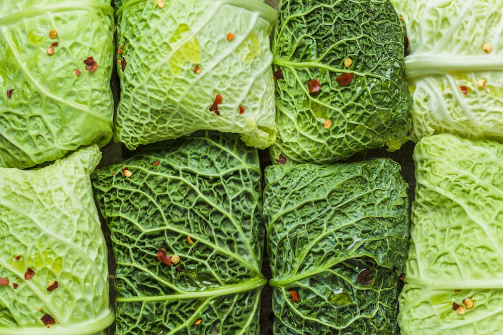 a close up of many green cabbages