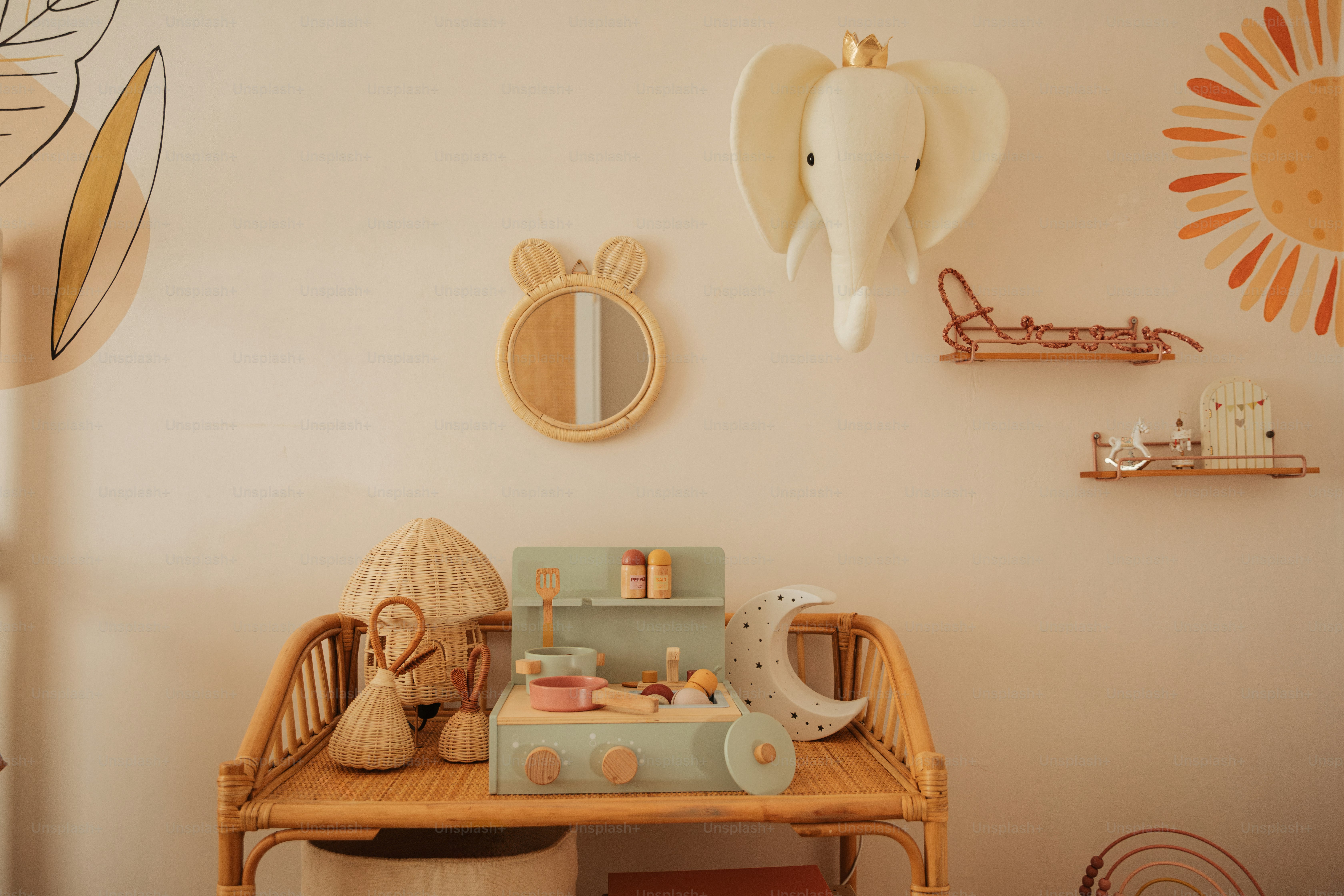 a table with a suitcase and a toy elephant on top of it