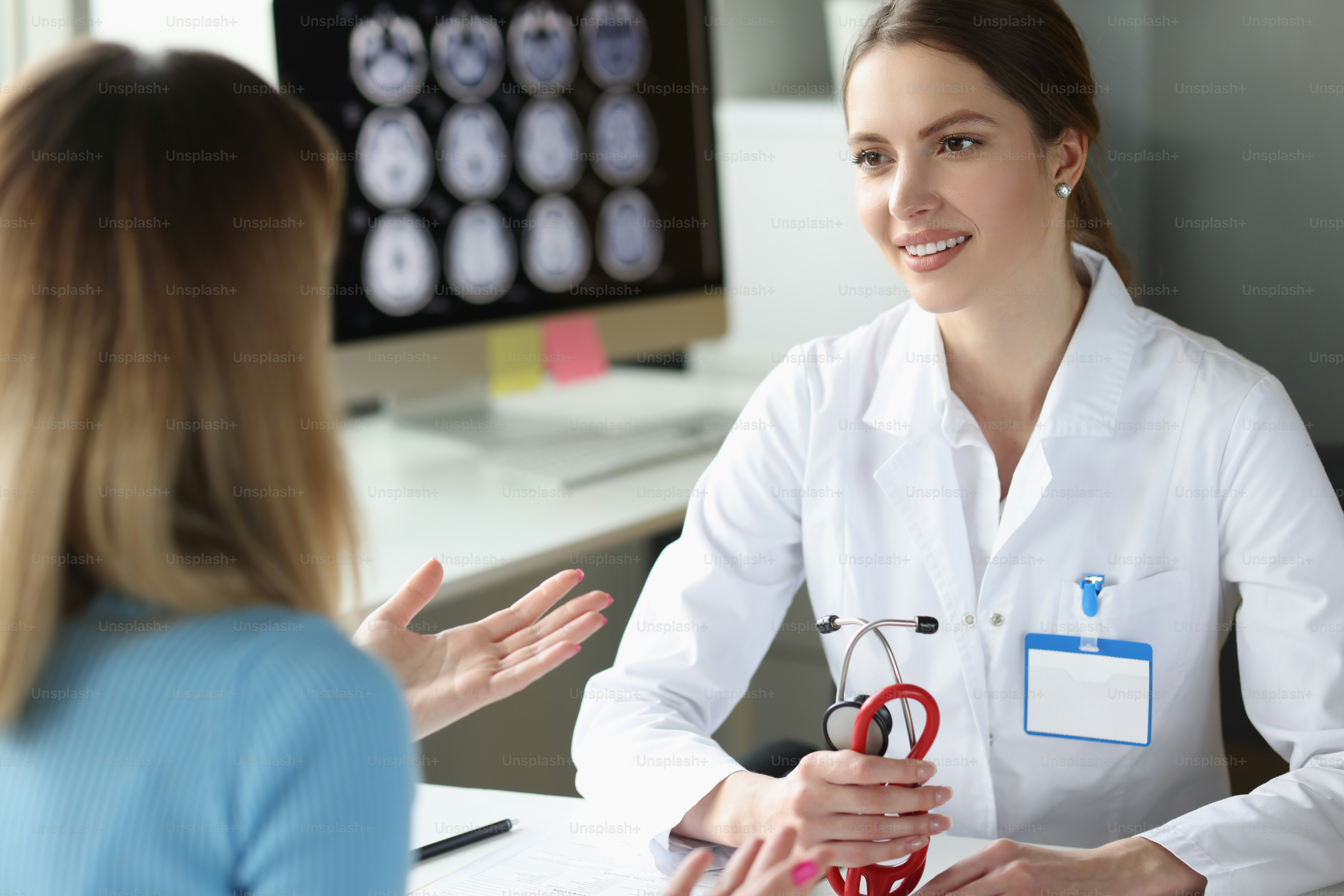 Doctor conducts medical advice to patient in office. Medical services and support concept