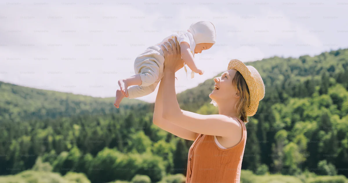 Mother And Baby Concept Of Natural Maternity And Motherhood Beautiful mother-and-baby-concept-of-natural-maternity-and-motherhood-beautiful