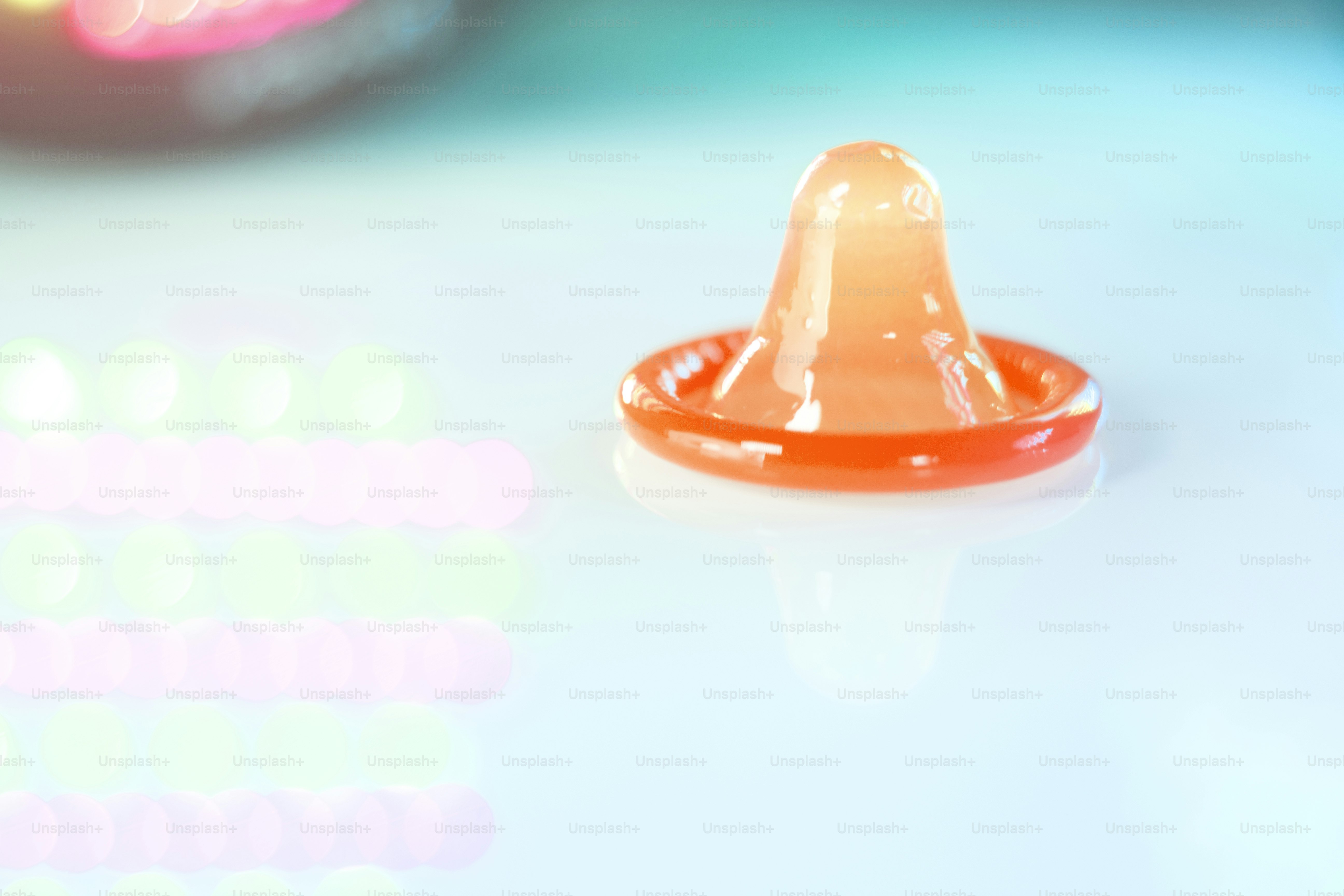 Rubber latex condom male contraceptive for safe disease and pregnancy free sex.