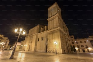 Night scene of Elche Cathedral in Alicante province, Spain.