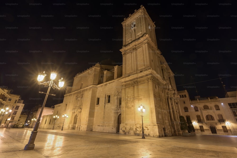 Night scene of Elche Cathedral in Alicante province, Spain.