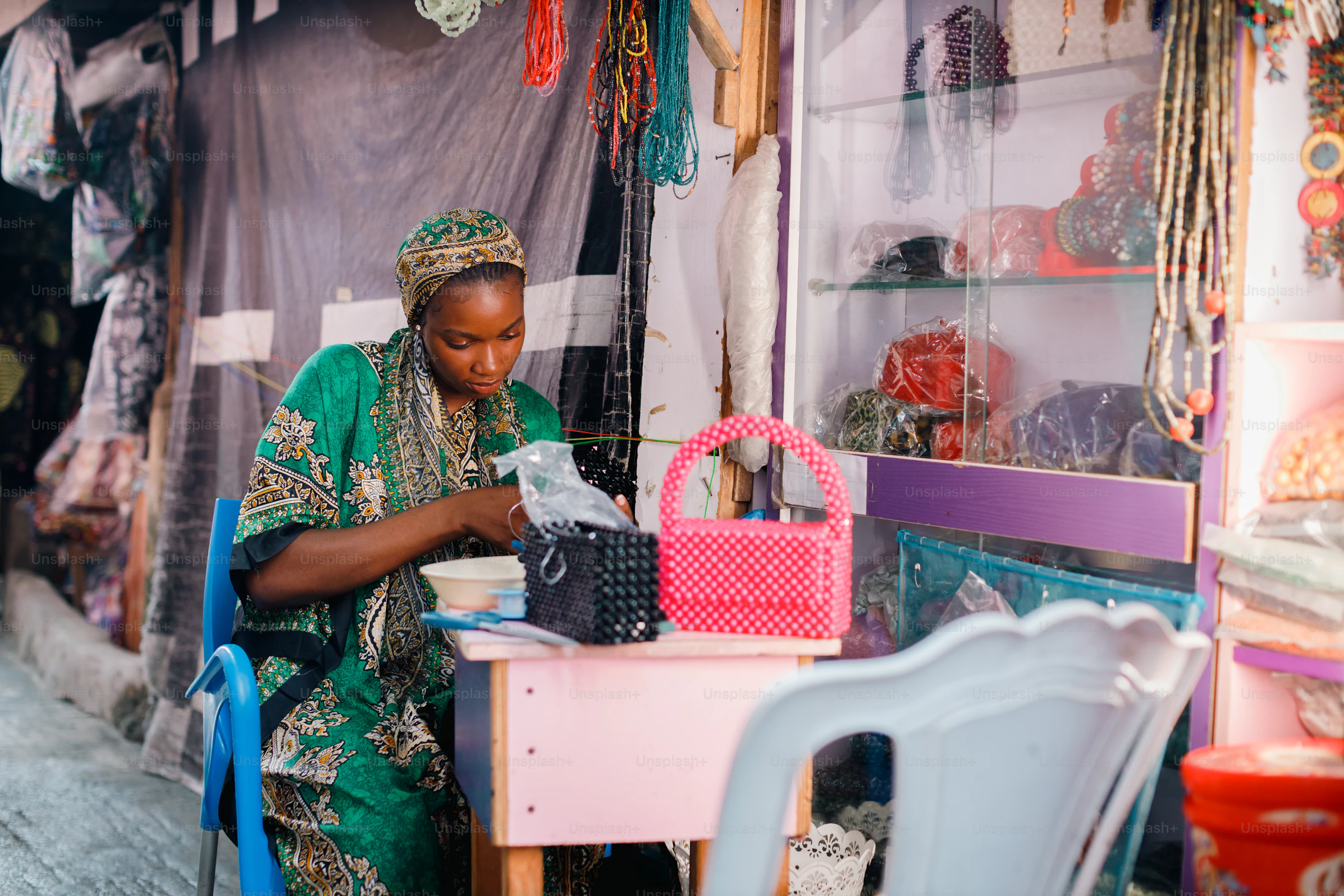 Nigerian SME business owner reviewing finances