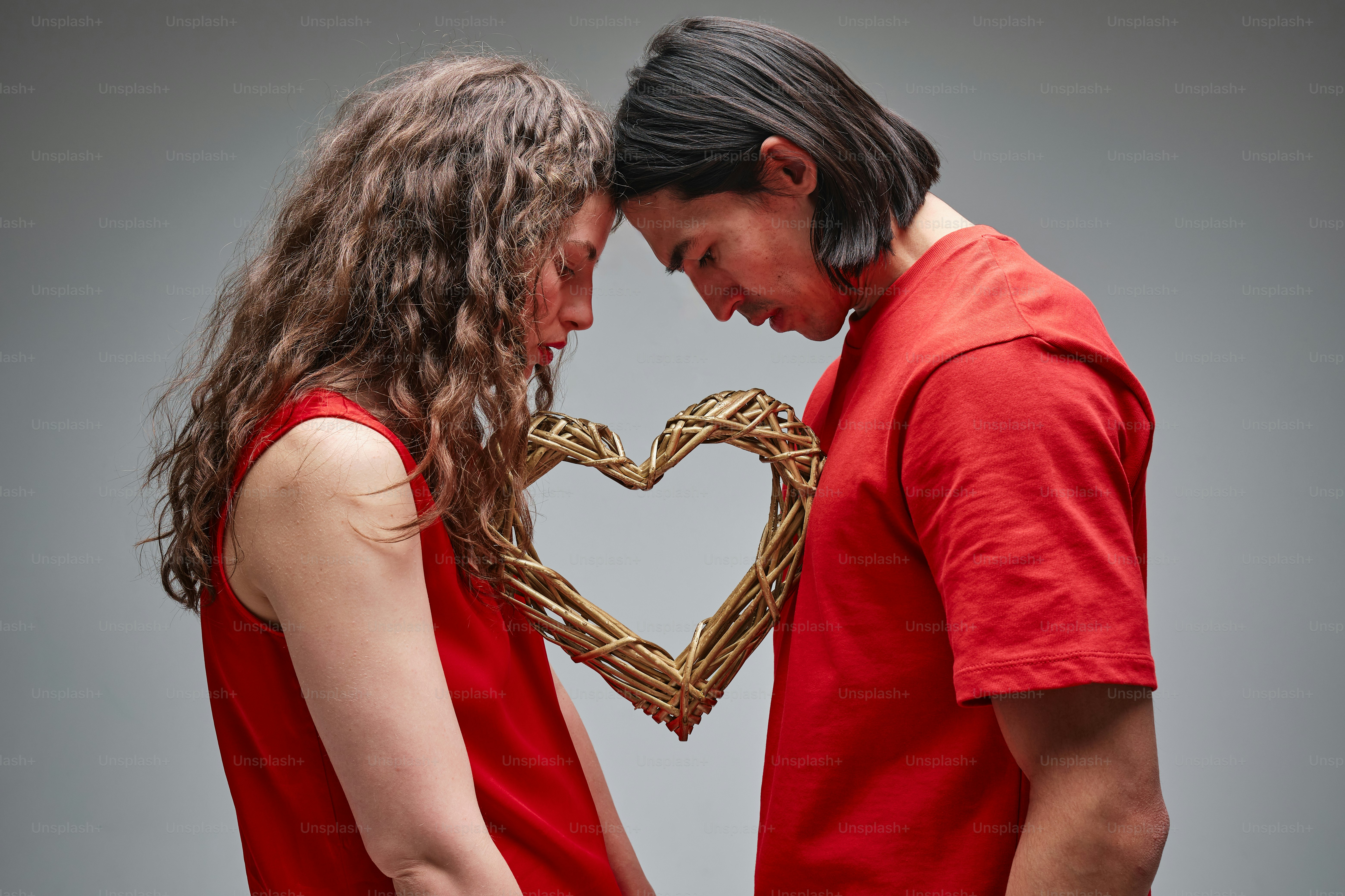 studio portrait of a couple in contemporary valentine's day aesthetics