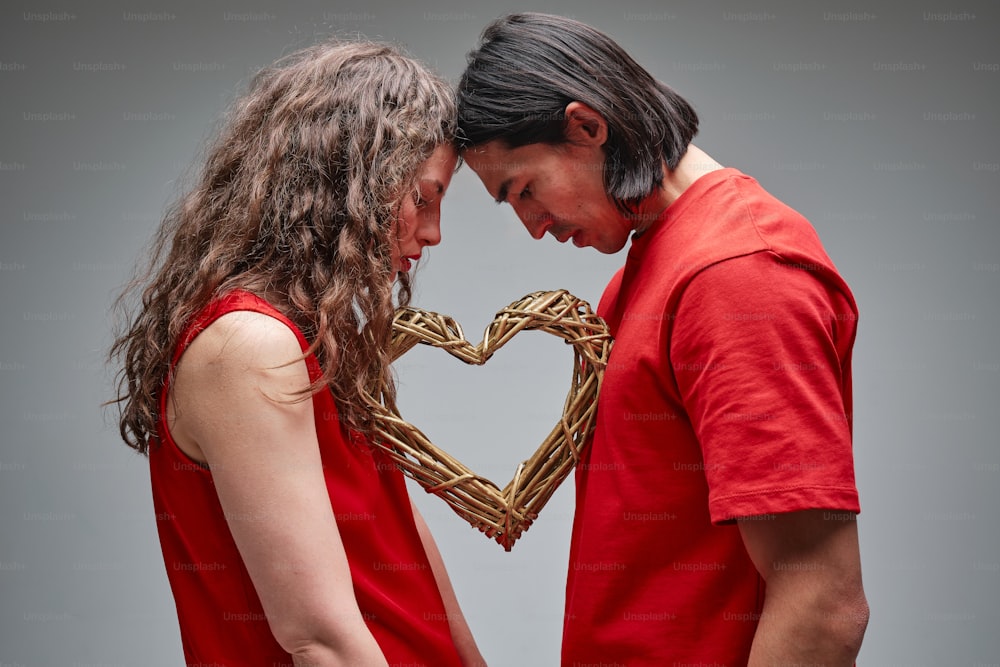 a man and a woman standing next to each other