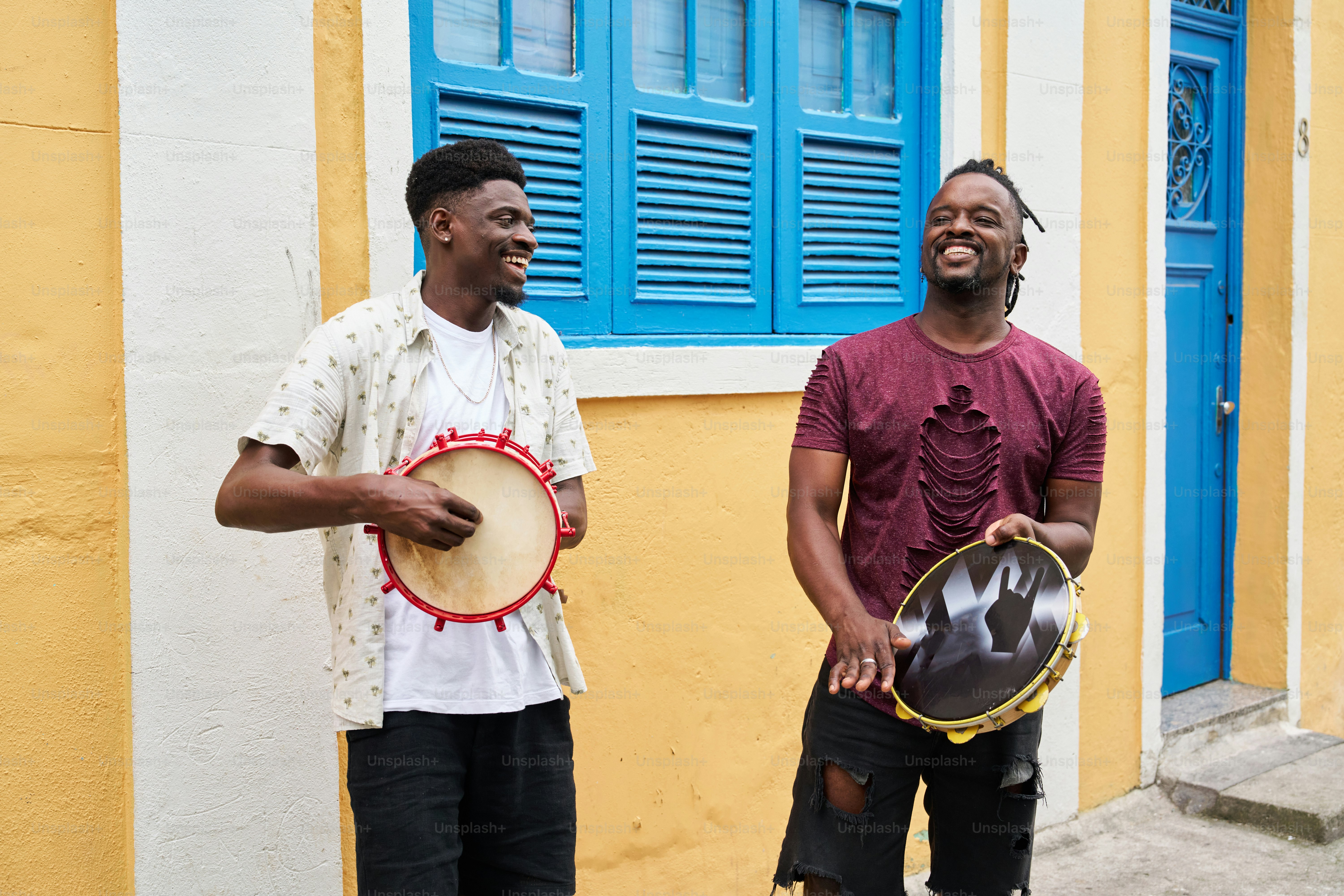 a couple of men standing next to each other