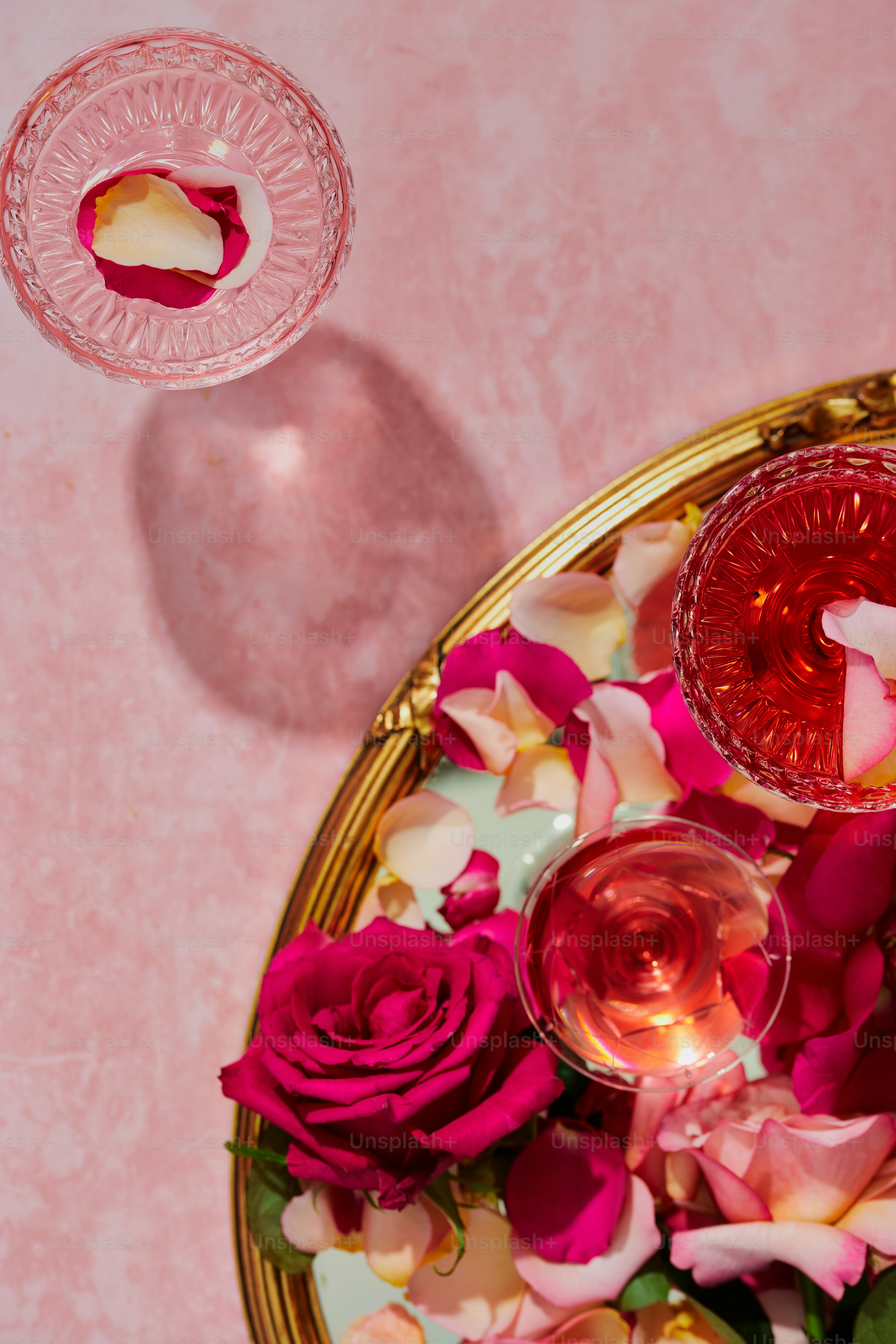 a plate of flowers and a candle on a table