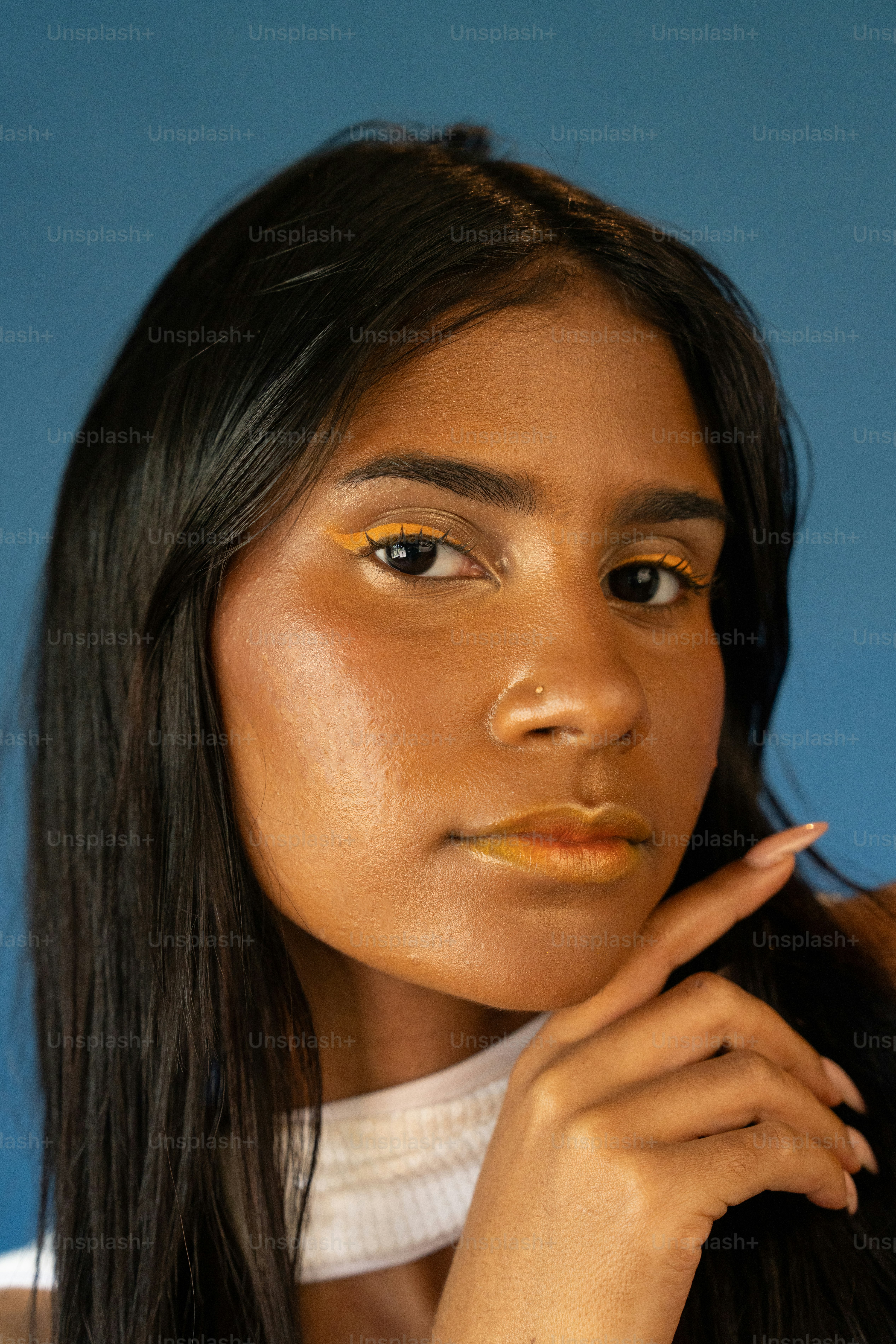 a close up of a person with a necklace on