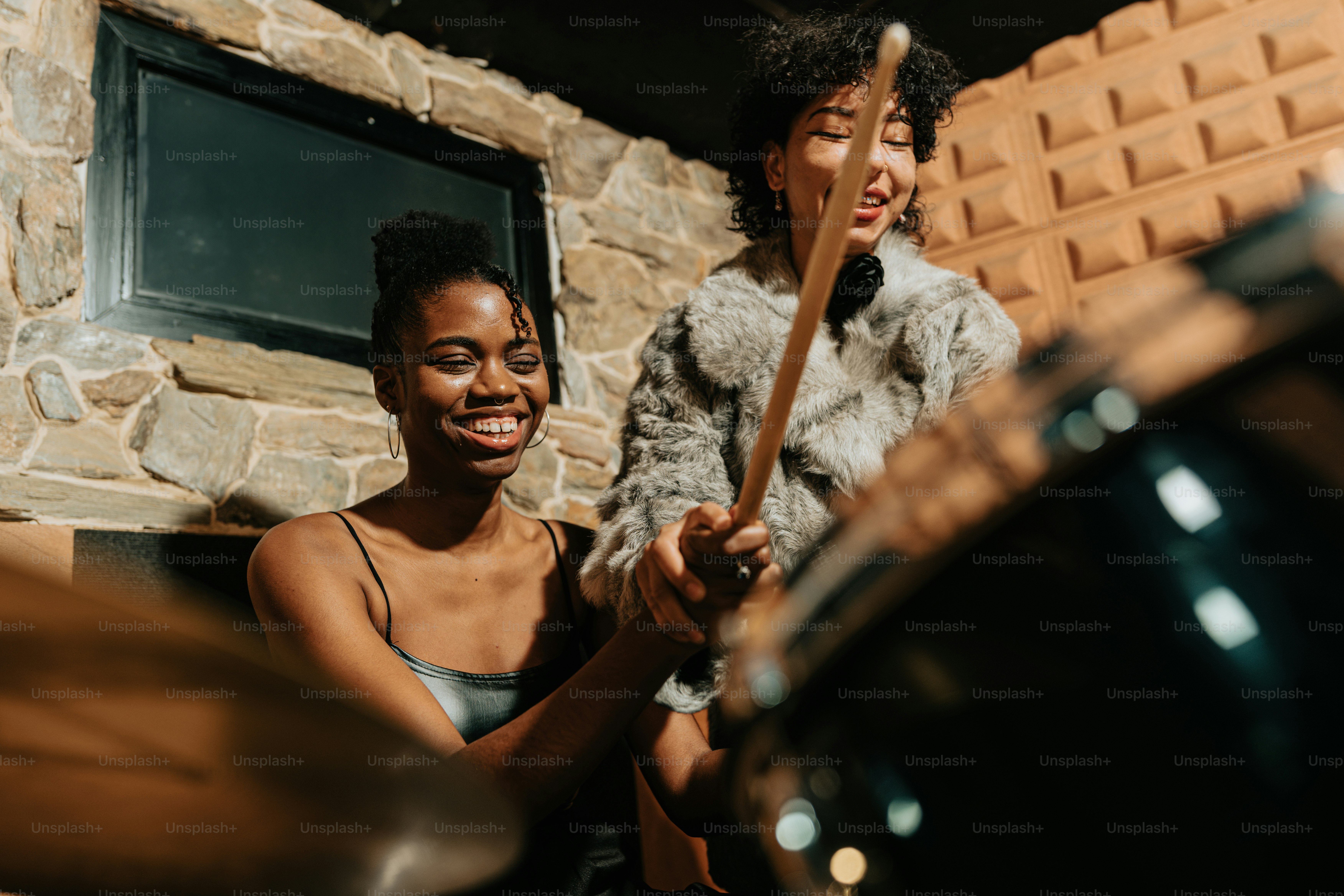 a couple of people that are playing drums