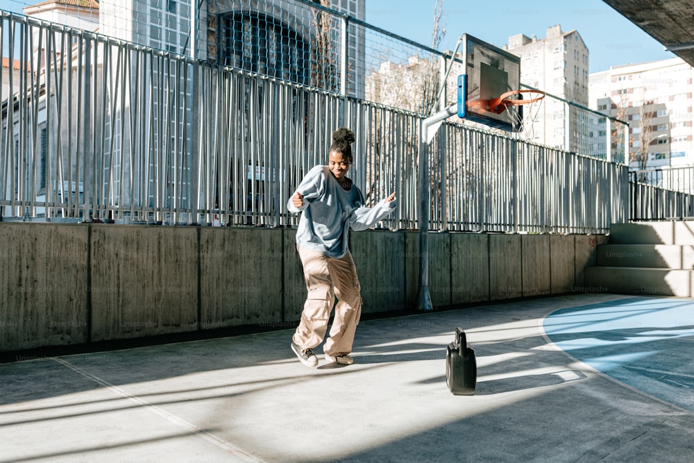 a man on a skateboard is playing basketball