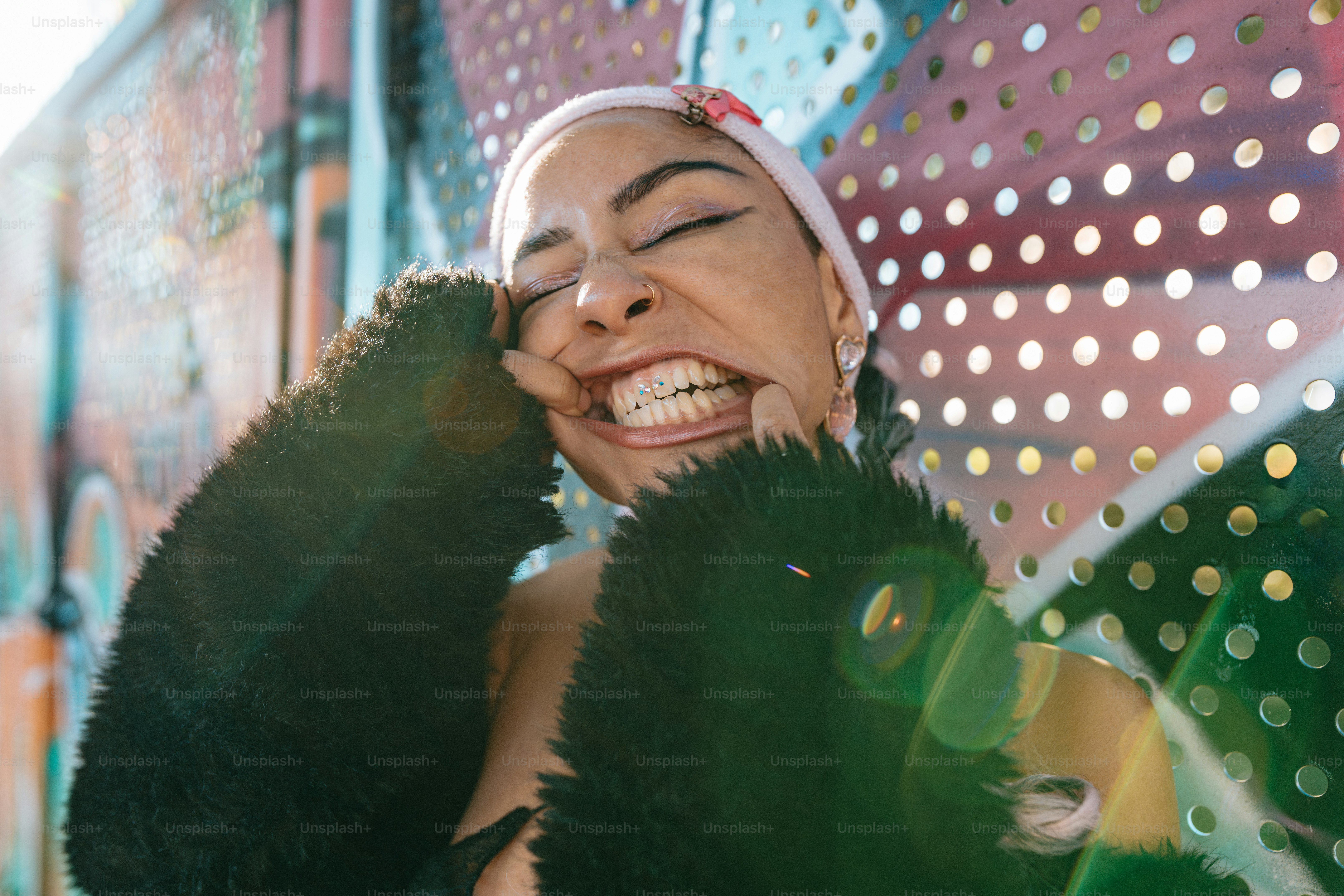 a woman with her eyes closed is smiling