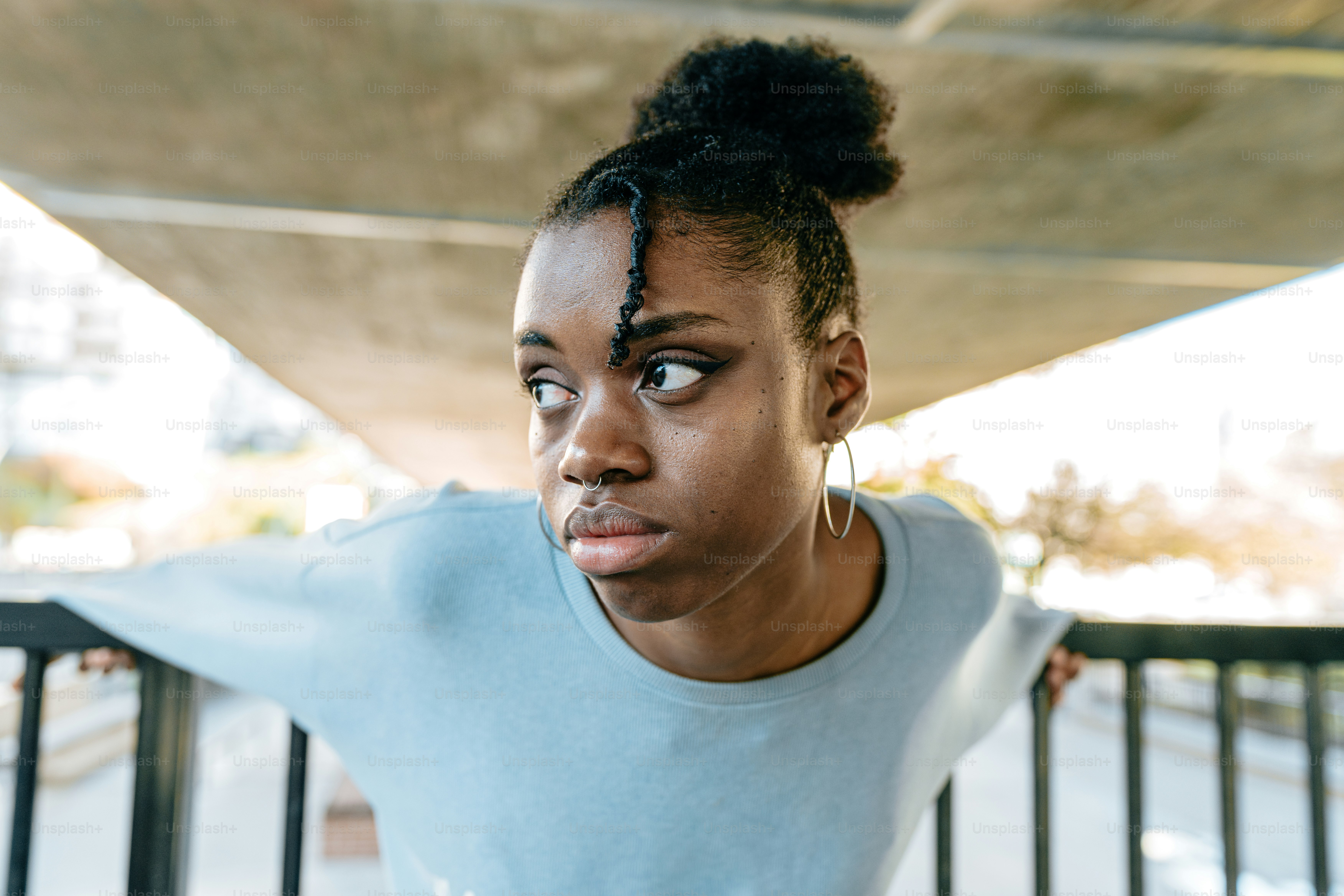 a close up of a person wearing a blue shirt