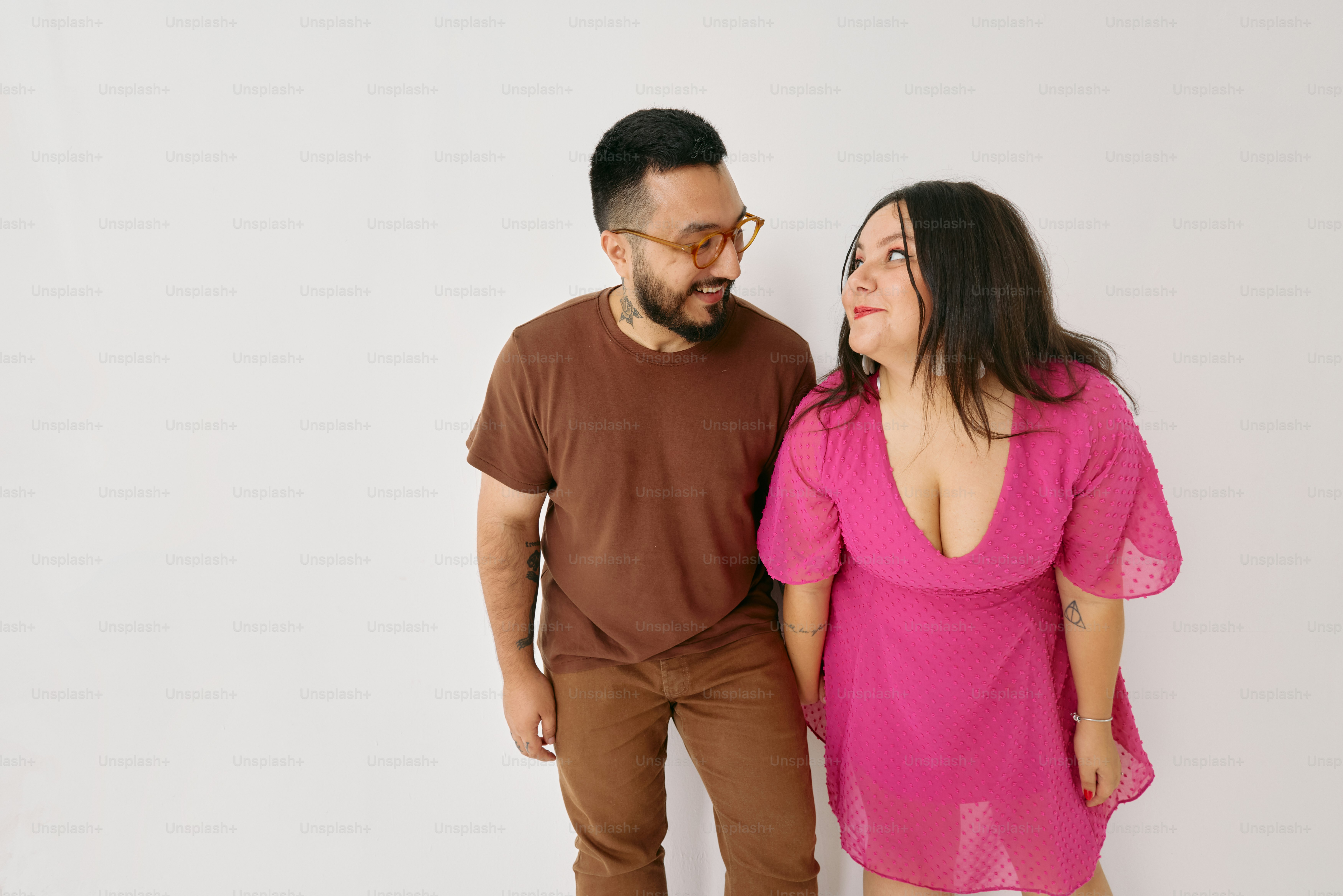 a man and a woman standing next to each other