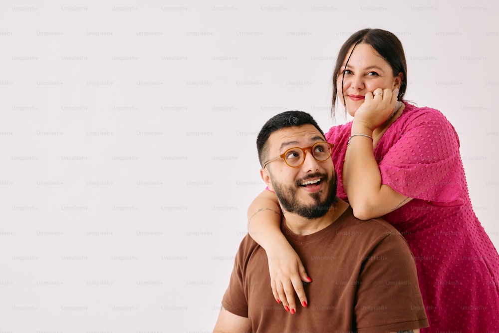 a man and woman posing for a picture