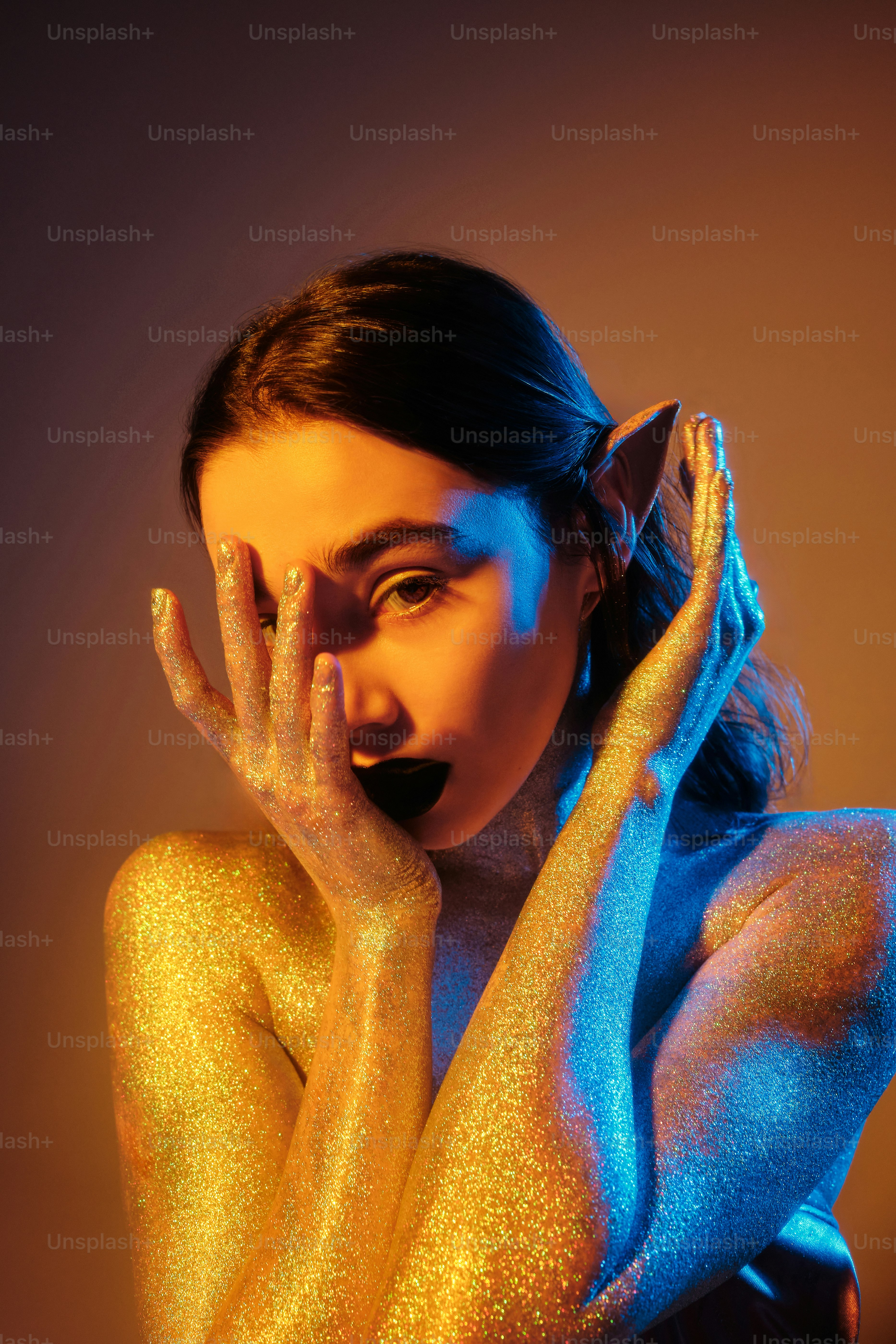 a woman with her hands on her face