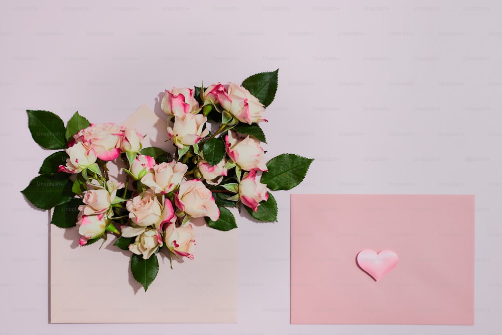 a bouquet of flowers and a card on a table