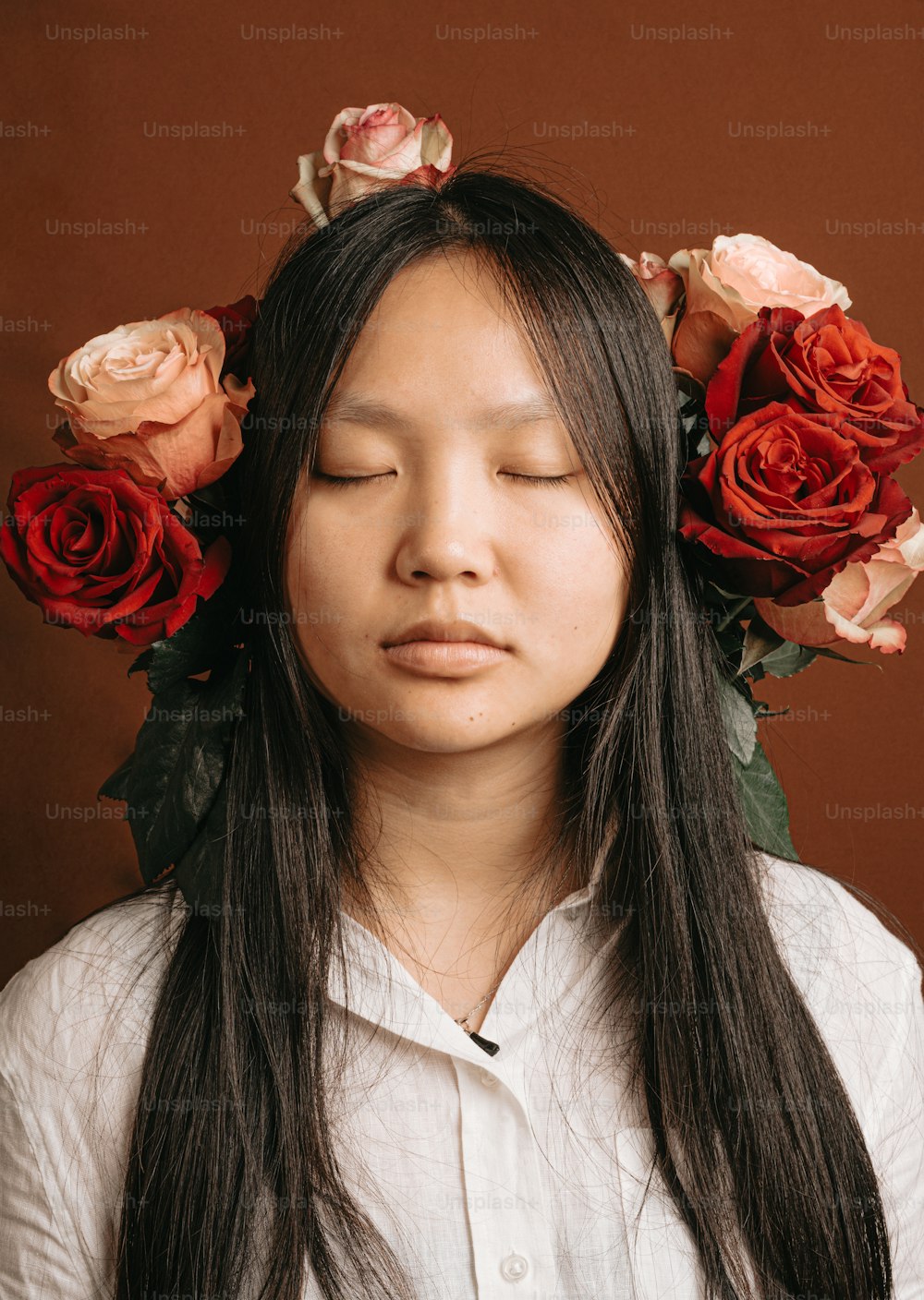 a woman with flowers in her hair