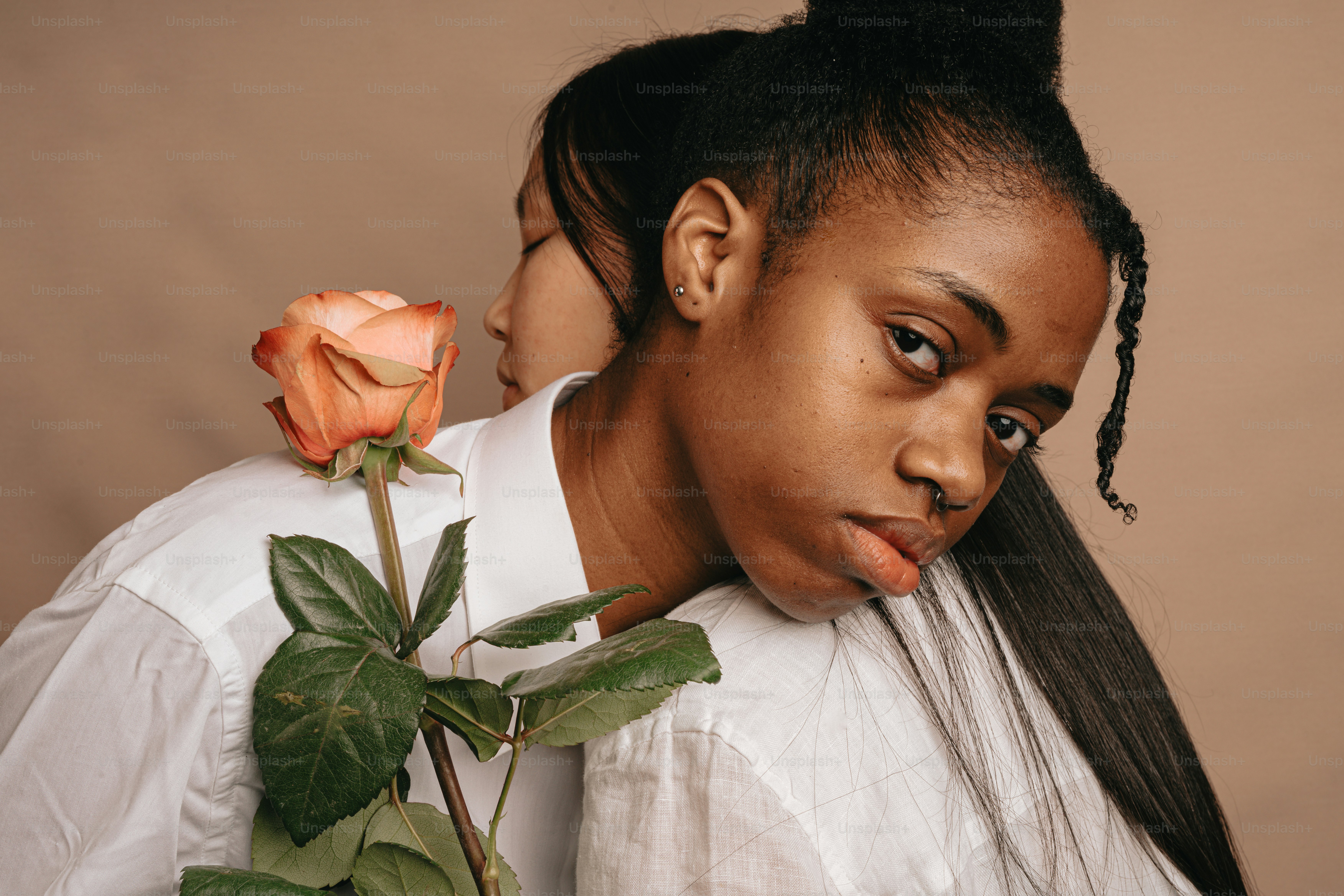A close up of a woman with flowers in her hair photo – Flower Image on ...
