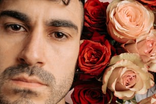 a close up of a person with flowers in the background