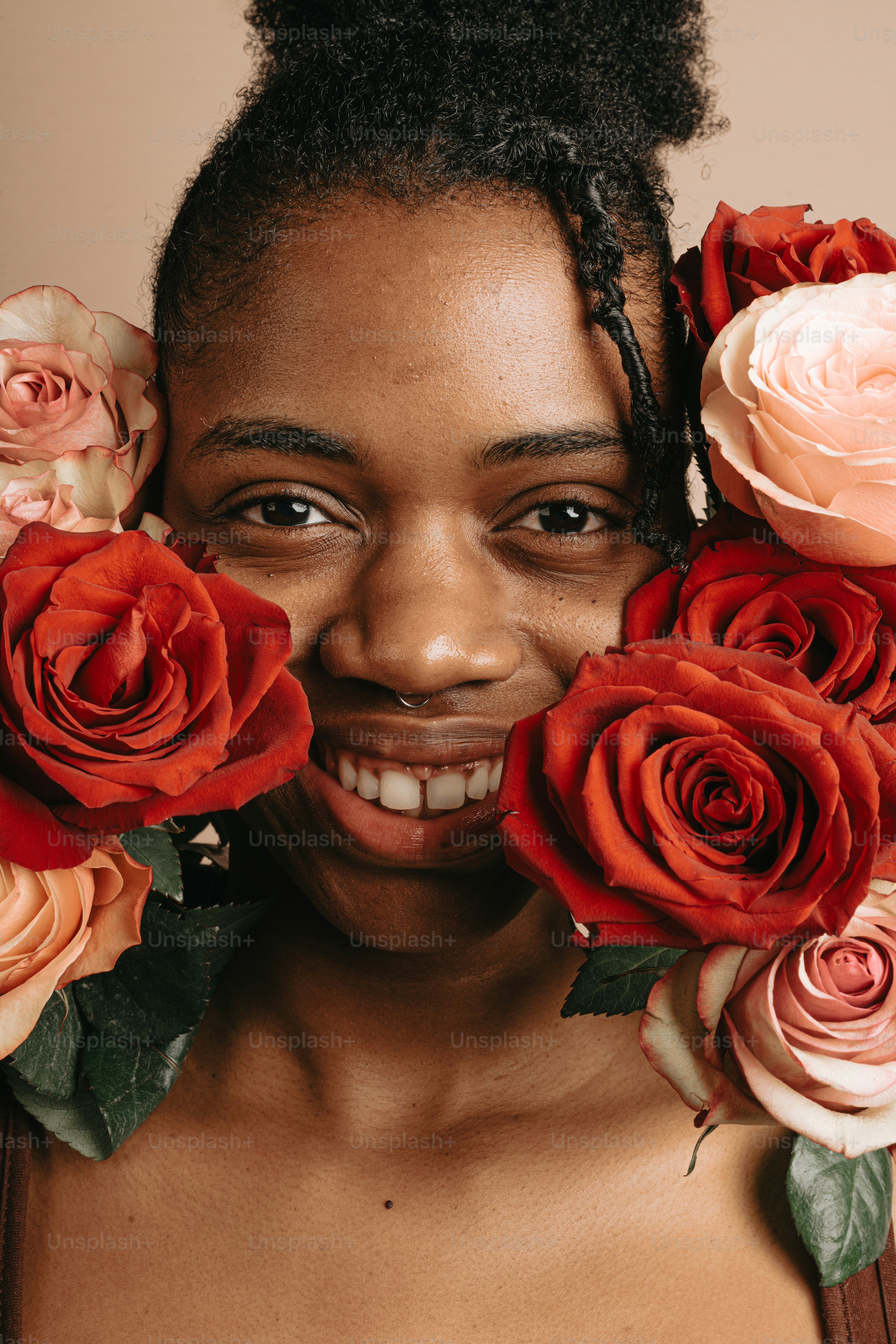 A woman with a flower in her hand photo – Flower Image on Unsplash