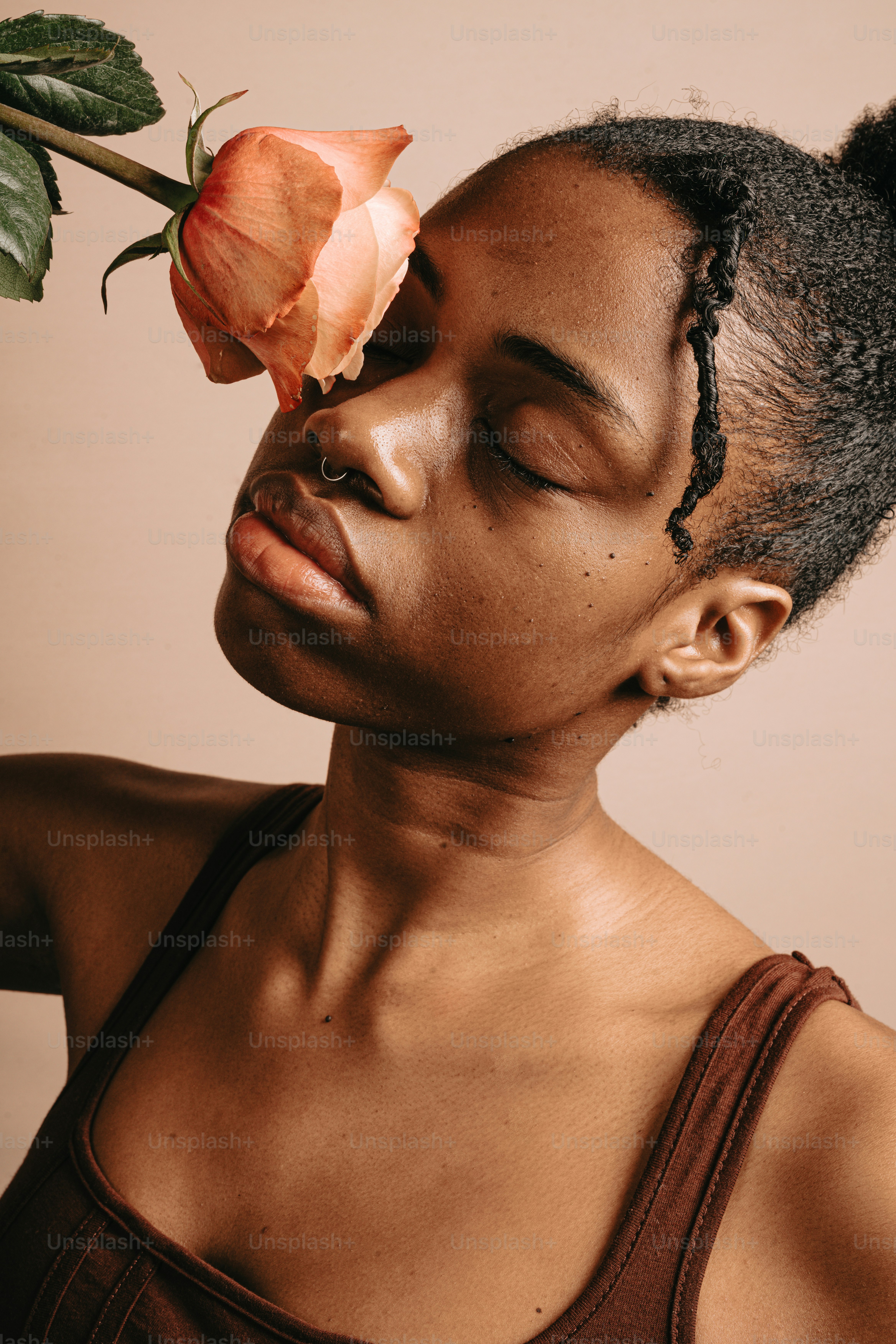 a woman with a flower in her hair