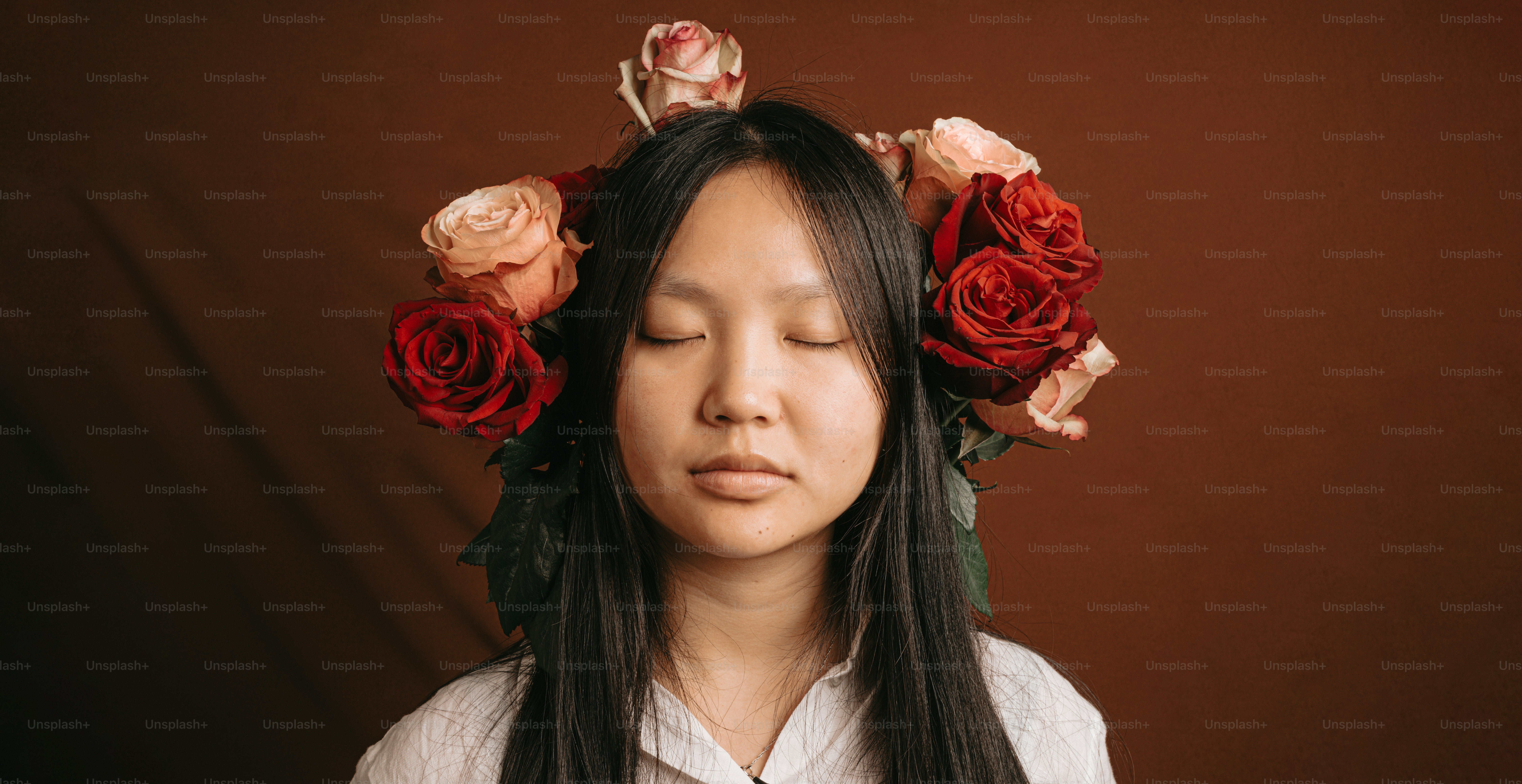a woman with a flower crown on her head