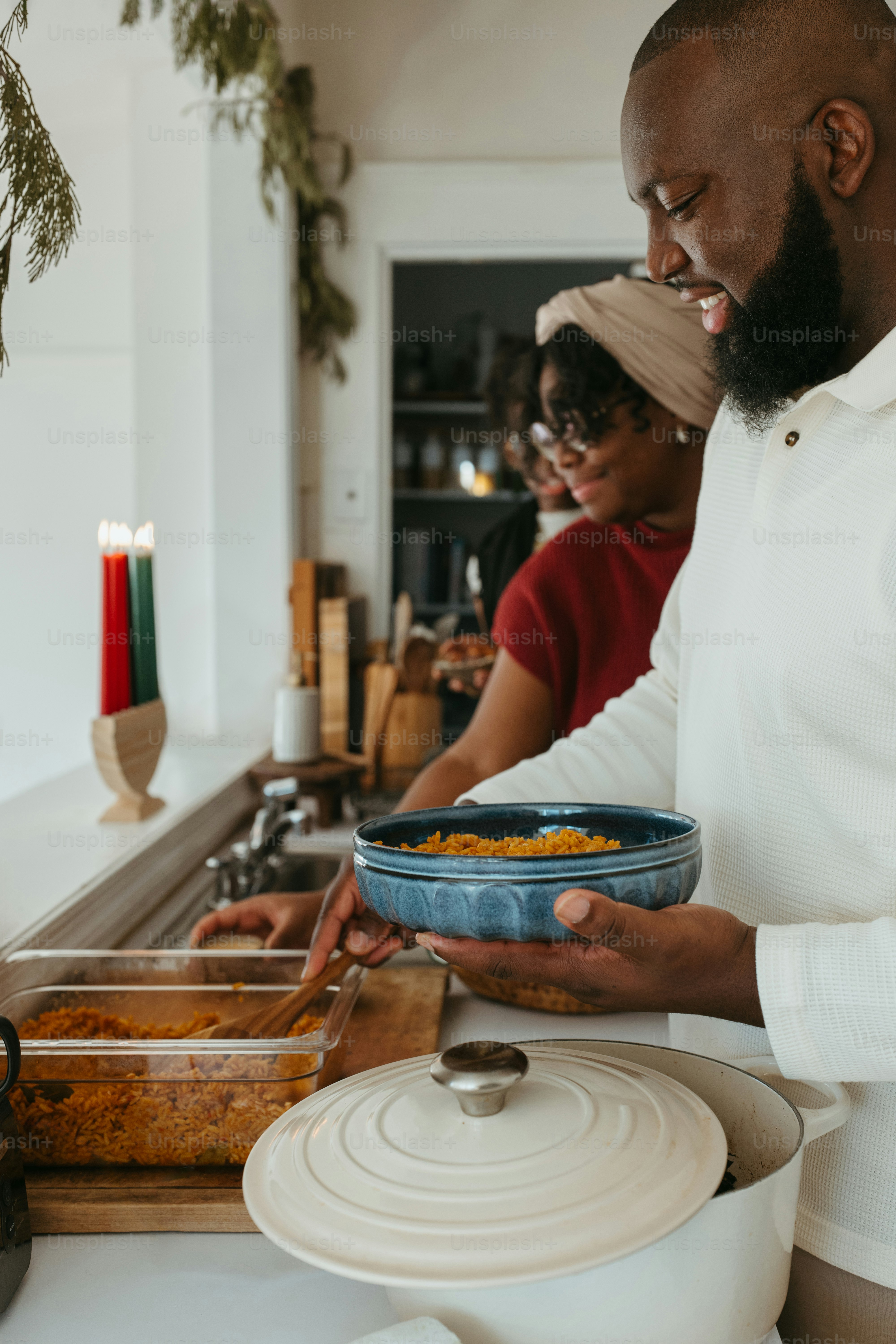 a man holding a bowl of food in his hands