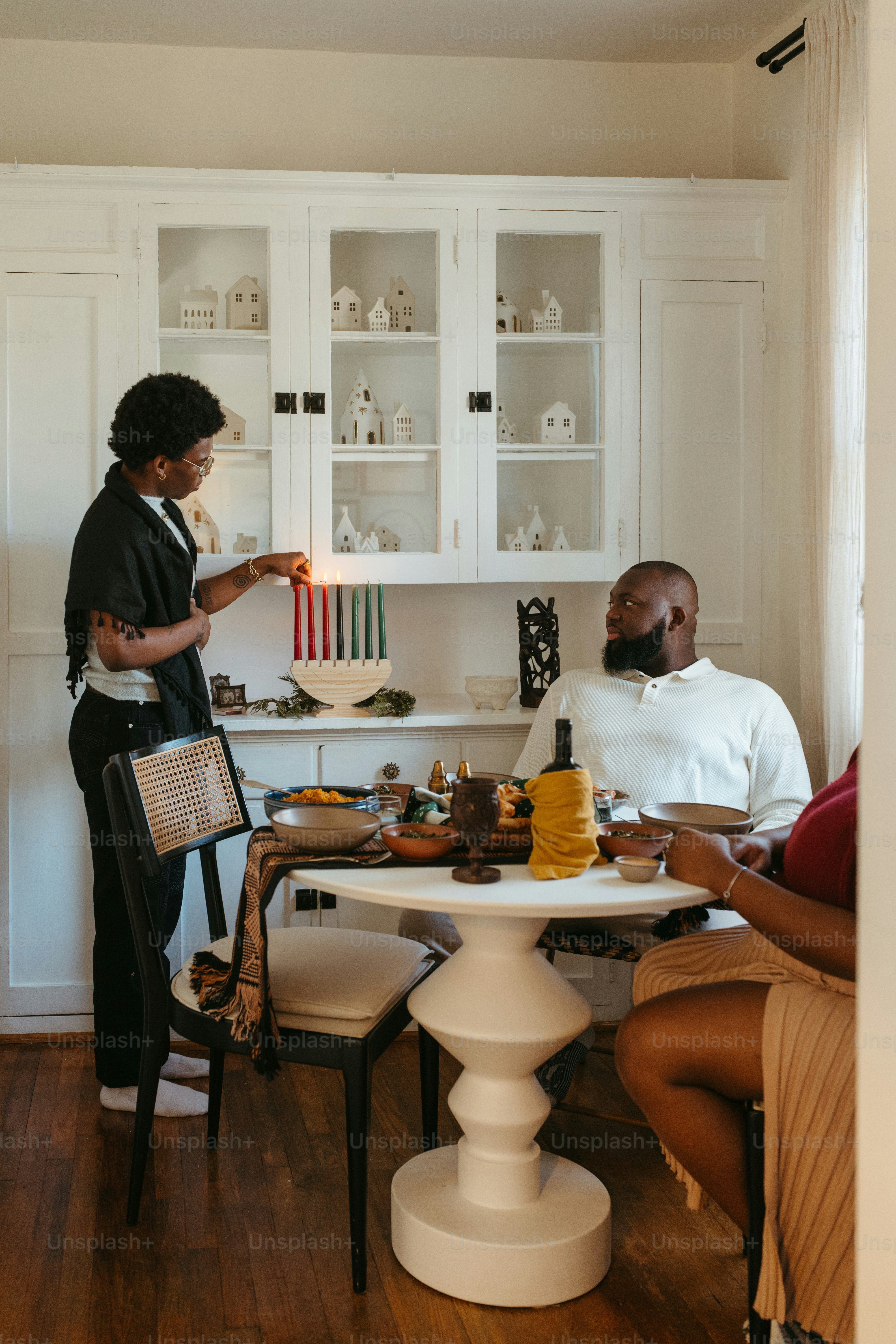a couple of people that are sitting at a table