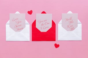 a couple of envelopes that have hearts on them