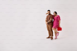 a man and a woman standing next to each other