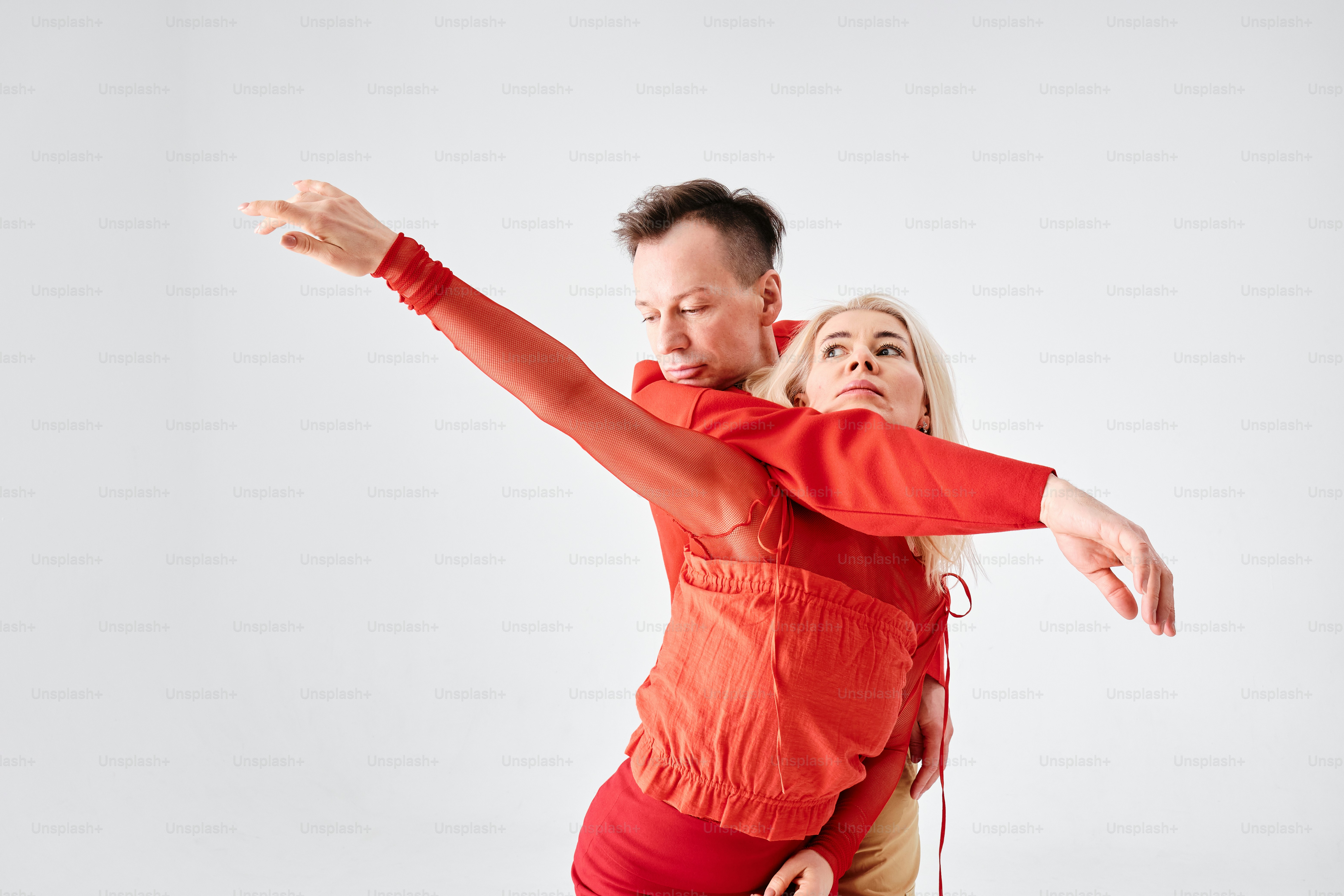 a couple of people that are standing up